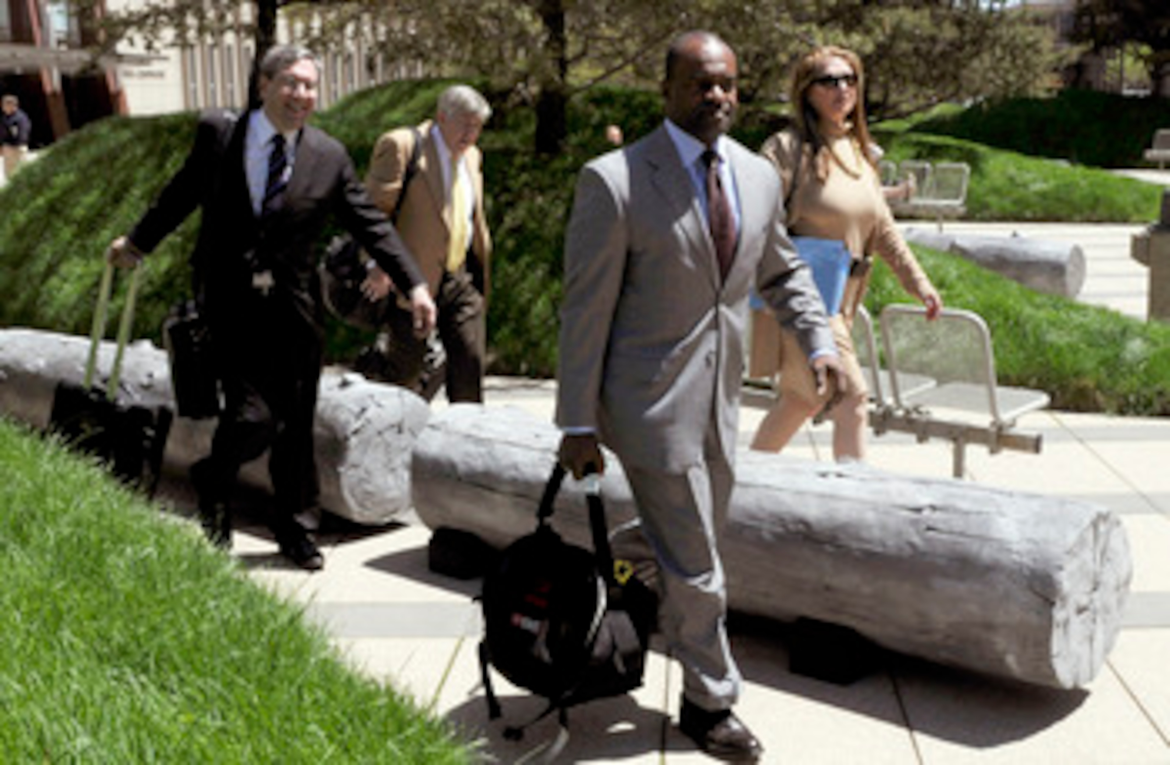 MINNEAPOLIS, MN - MAY 17: NFL players' lawyers Jeffrey Kessler, James Quinn and Barbara P. Berens walk with former NFL Players Association executive director DeMaurice Smith after leaving court ordered mediation at the U.S. Courthouse on May 17, 2011 in M