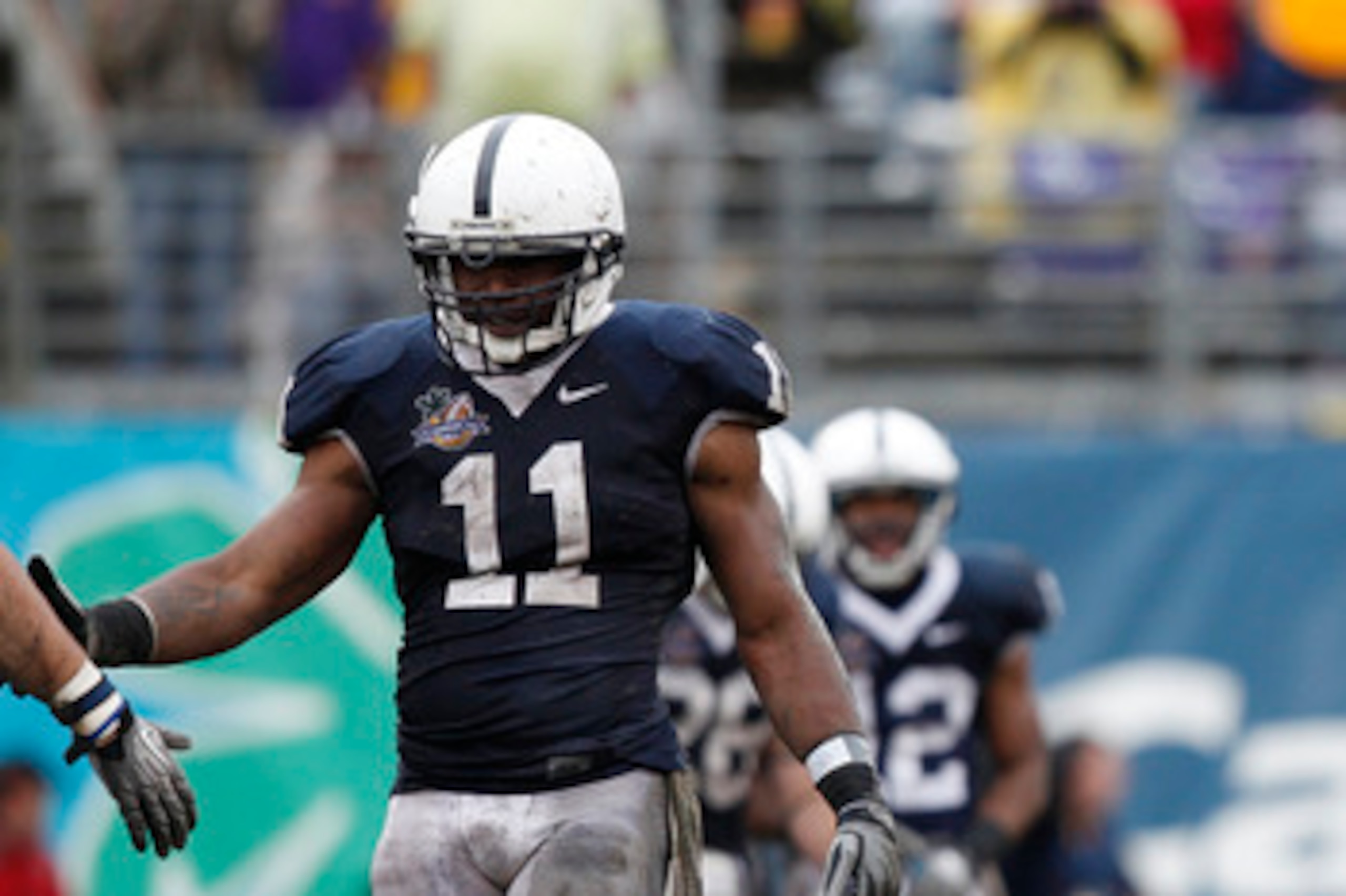 ORLANDO, FL - JANUARY 1: Jordan Jefferson #9 of the LSU Tigers lobbies for a late hit after being hit by Navorro Bowman #11 of the Penn State Nittany Lions during the 2010 Capital One Bowl at the Florida Citrus Bowl Stadium on January 1, 2010 in Orlando,