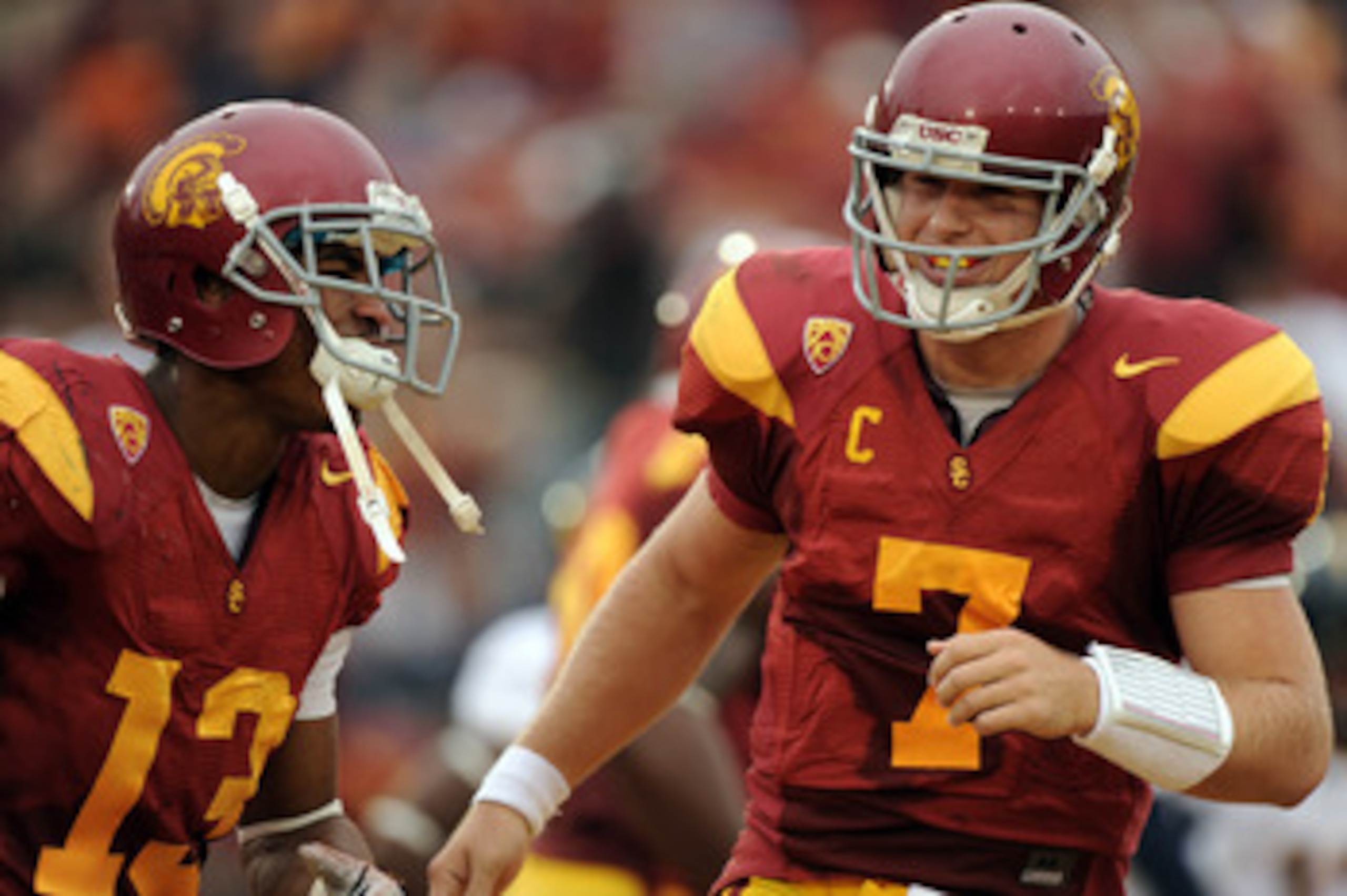 LOS ANGELES, CA - OCTOBER 16:  Matt Barkley #7 and Robert Woods #13 of the USC Trojans celebrate a touchdown for a 28-0 lead over the California Golden Bears during the second quarter at Los Angeles Memorial Coliseum on October 16, 2010 in Los Angeles, Ca