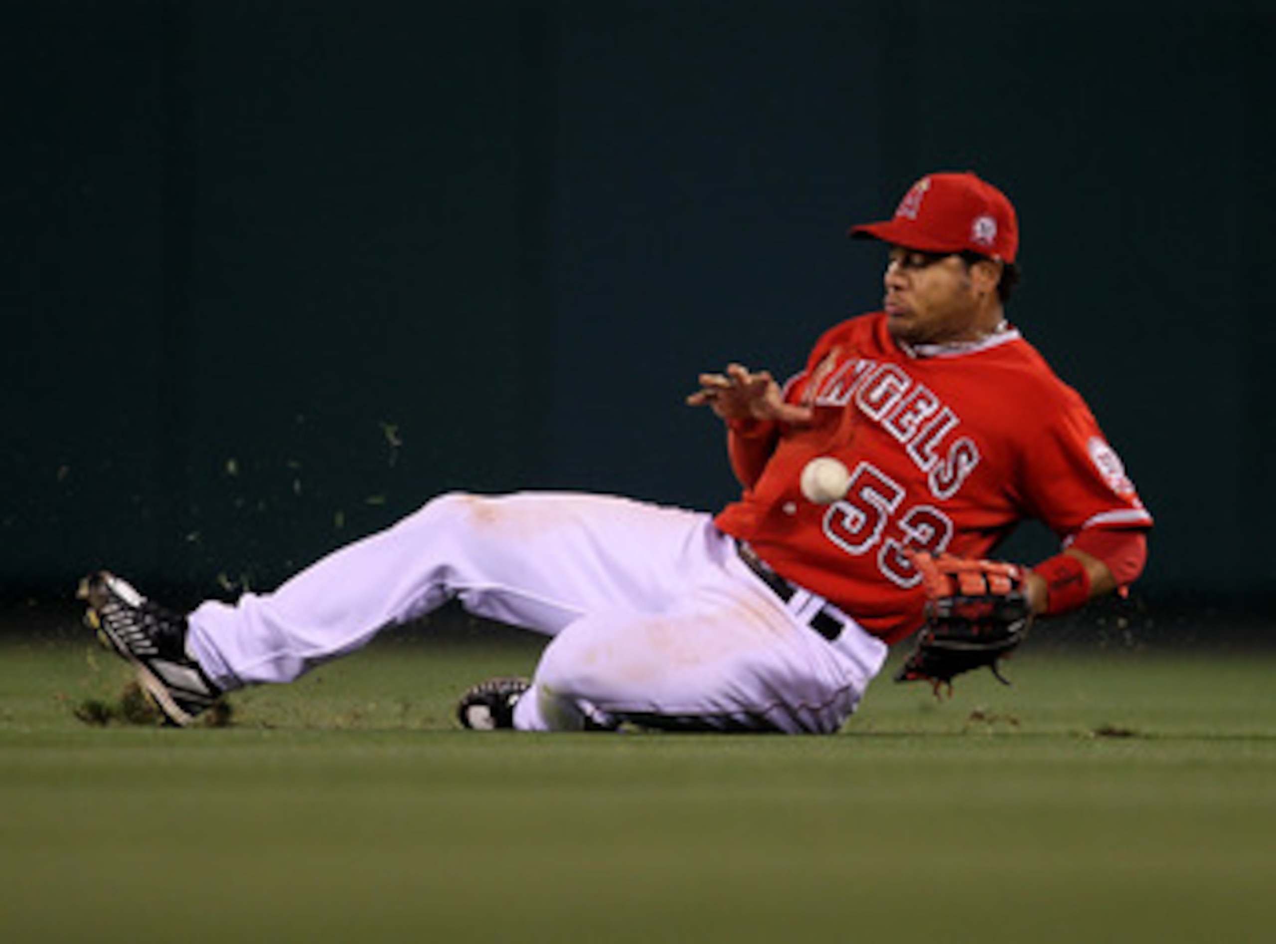 ANAHEIM, CA - APRIL 23:  Right fielder Bobby Abreu #53 of the Los Angeles Angels of Anaheim slides back can't reach a single hit by J.D. Drew of the Boston Red Sox on April 23, 2011 at Angel Stadium in Anaheim, California.    (Photo by Stephen Dunn/Getty