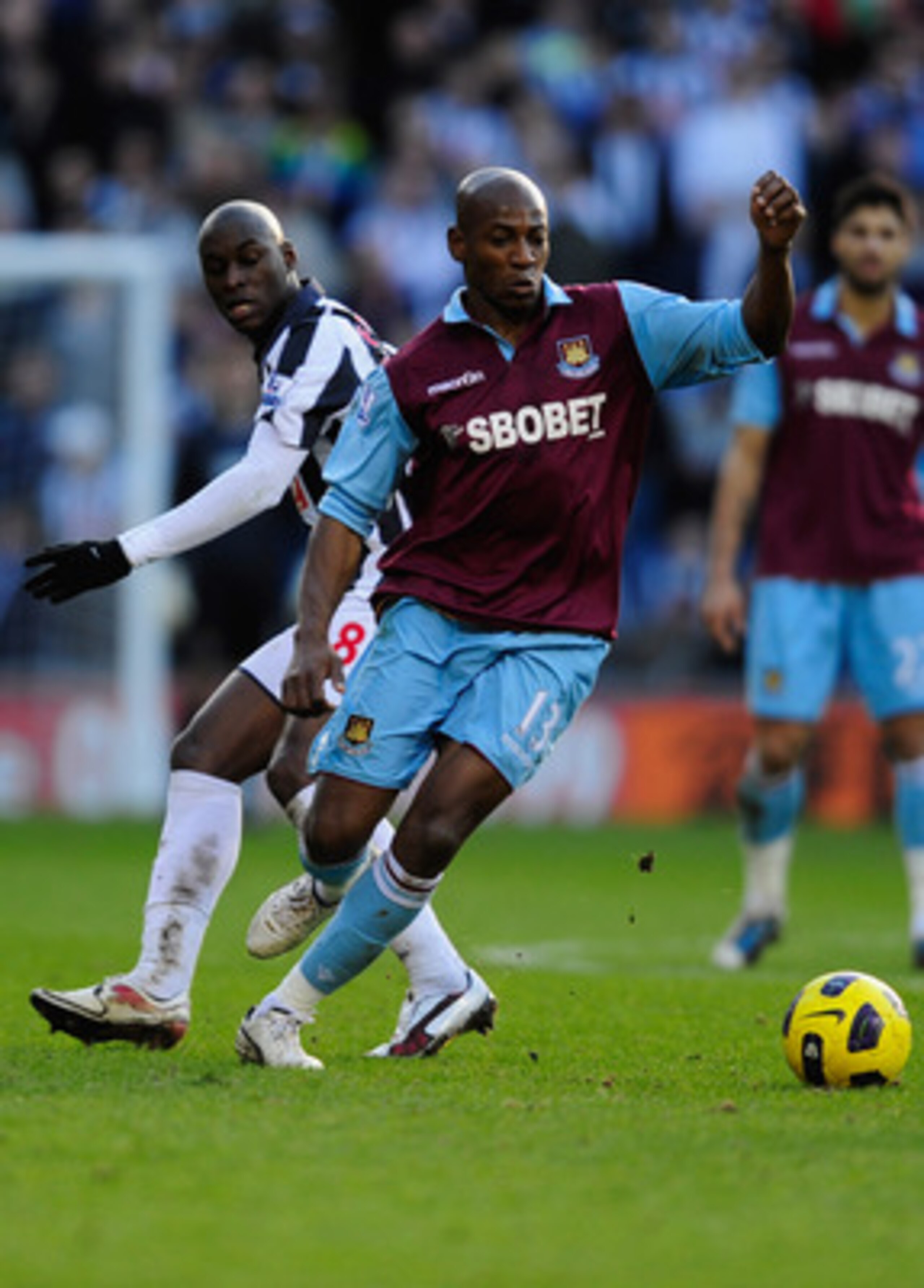 WEST BROMWICH, ENGLAND - FEBRUARY 12:  Luis Boa Morte of West Ham United battles with Marc Antoine Fortune of West Bromwich Albion during the Barclays Premiership match between West Bromwich Albion and West Ham United at The Hawthorns on February 12, 2011