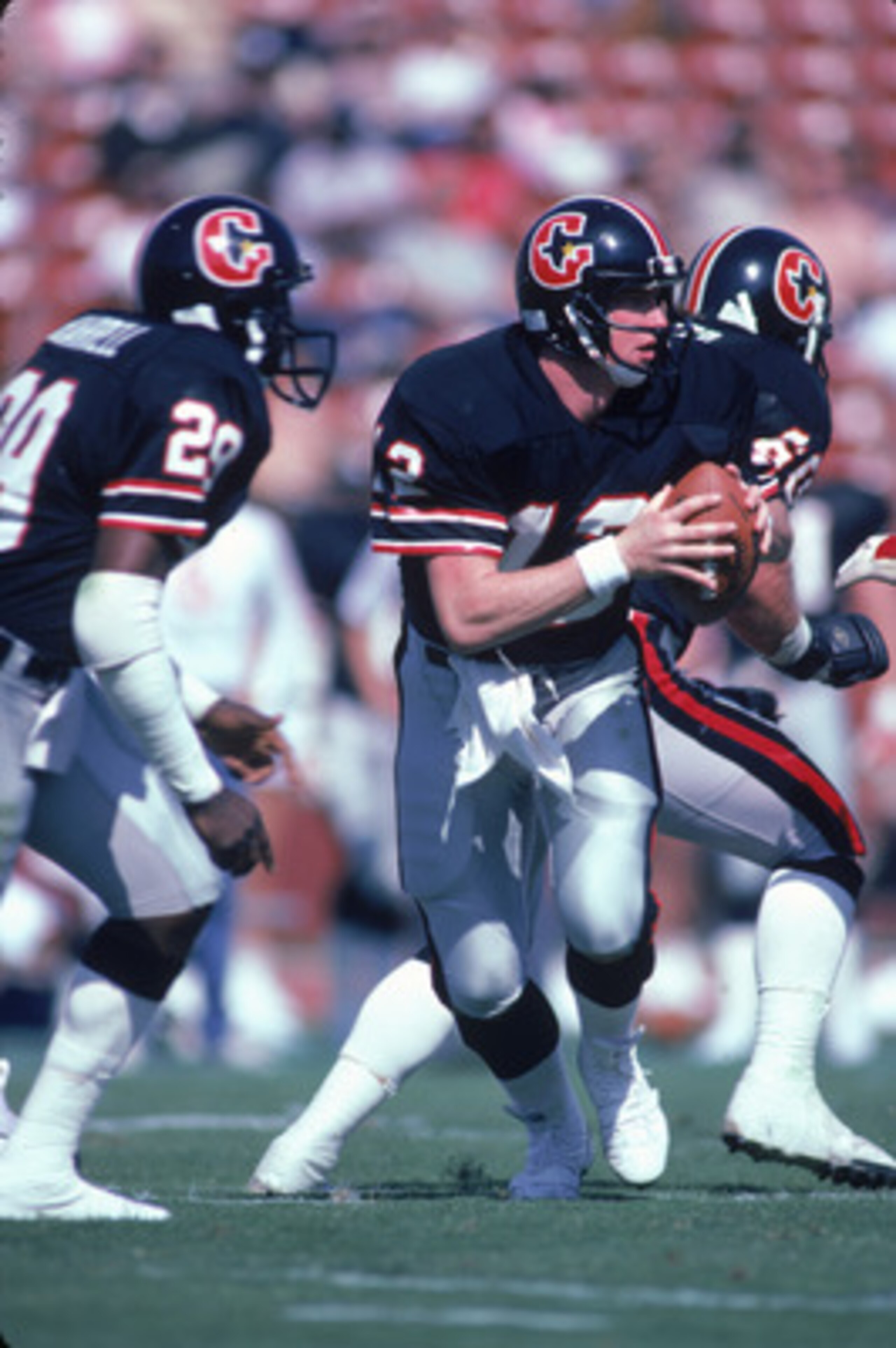 FEBRUARY 1985:  Quarterback Jim Kelly #12 of the Houston Gamblers scrambles during a 1985 season USFL game. (Photo by Stephen Dunn/Getty Images)