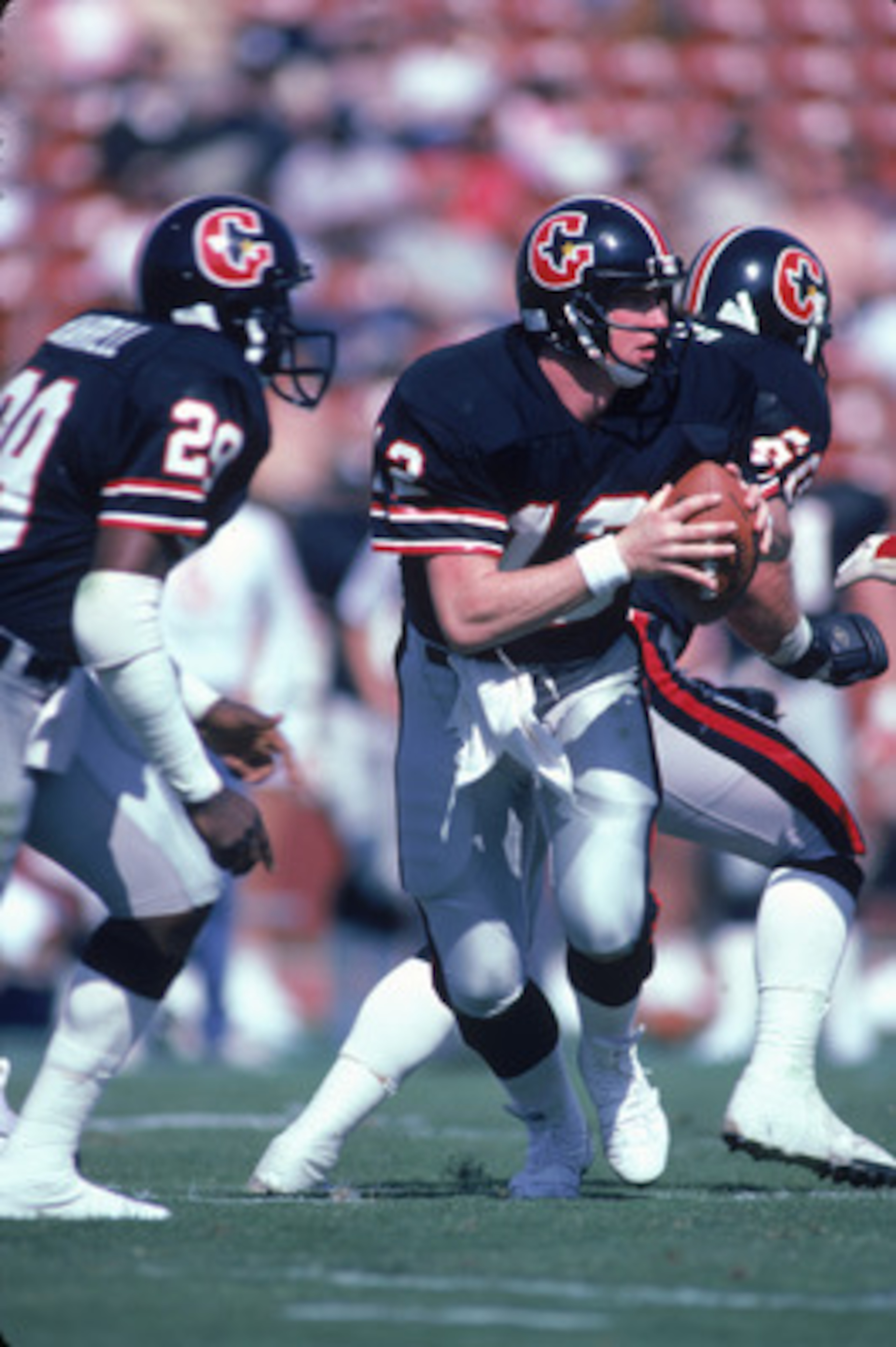 FEBRUARY 1985:  Quarterback Jim Kelly #12 of the Houston Gamblers scrambles during a 1985 season USFL game. (Photo by Stephen Dunn/Getty Images)