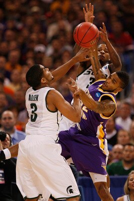 ST. LOUIS - MARCH 26: Chris Allen #3 and Korie Lucious #34 both of the Michigan State Spartans look to out rebound Anthony James #52 of the Northern Iowa Panthers during the midwest regional semifinal of the 2010 NCAA men's basketball tournament at the Ed