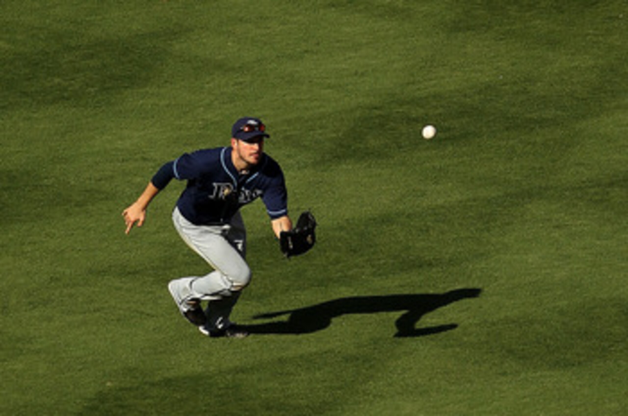 MIAMI GARDENS, FL - MAY 21: Matt Joyce #20 of the Tampa Bay Rays makes a catch during a game against the Florida Marlins at Sun Life Stadium on May 21, 2011 in Miami Gardens, Florida. (Photo by Mike Ehrmann/Getty Images)