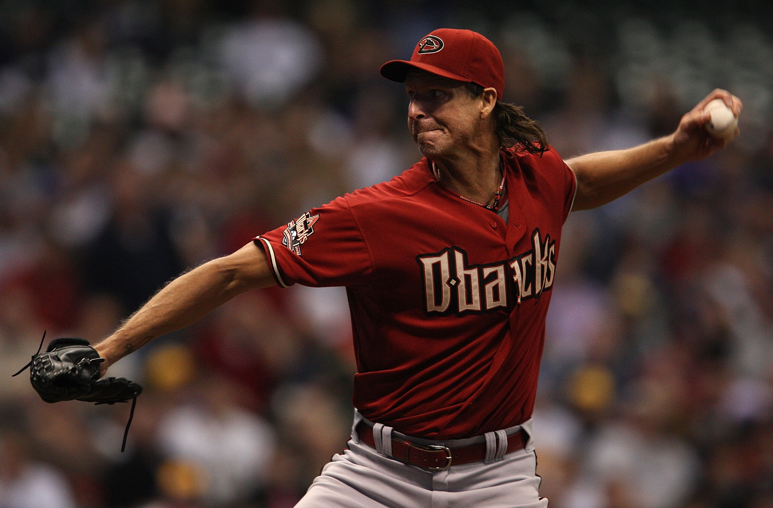 MILWAUKEE - JUNE 03: Randy Johnson #51 of the Arizona Diamondbacks throws against the Milwaukee Brewers on June 3, 2008 at Miller Park in Milwaukee, Wisconsin. Johnson passed Roger Clemens for second place on the all-time strikeout list during tonight's g
