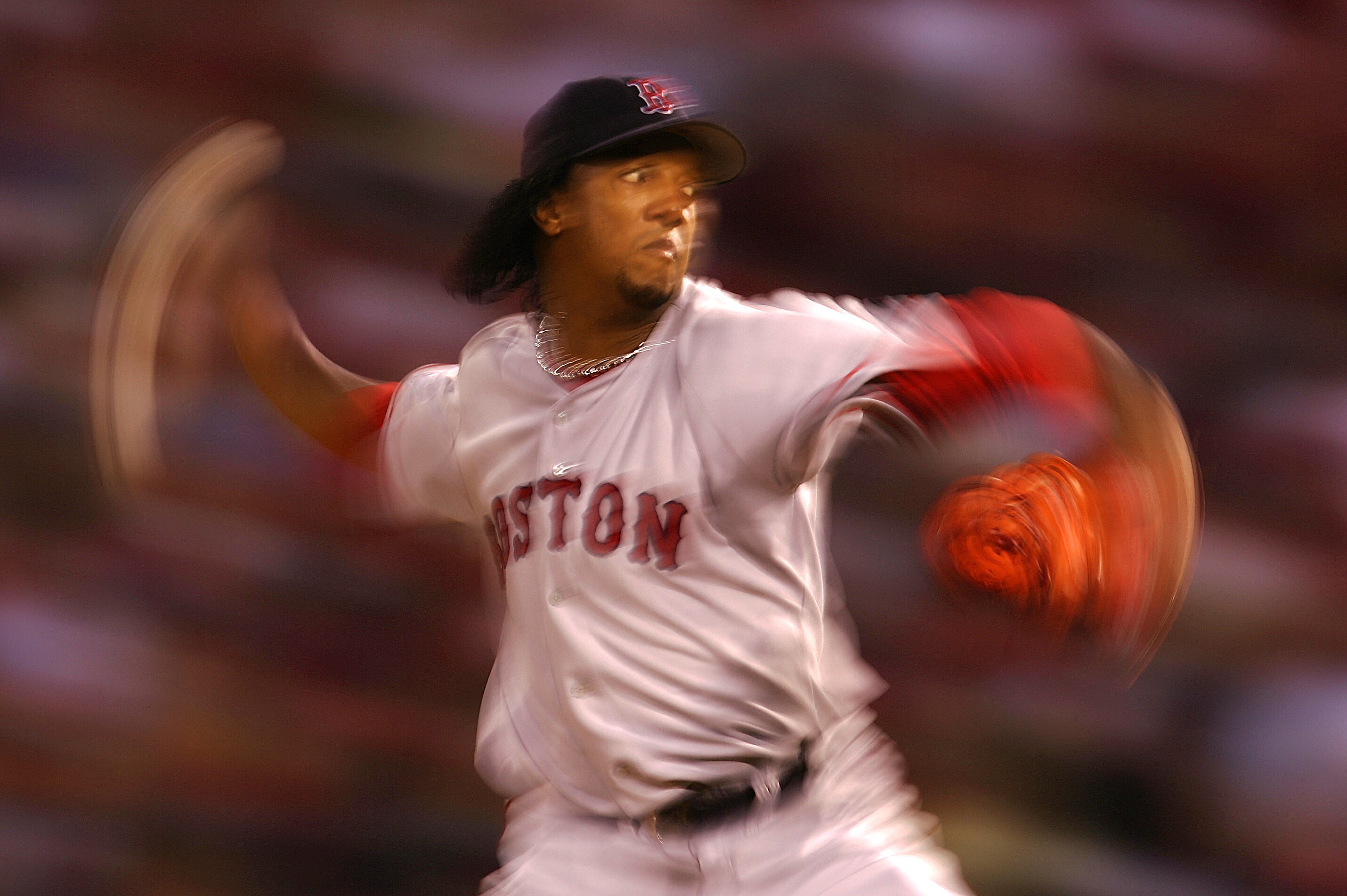 ST LOUIS - OCTOBER 26:  Starting pitcher Pedro Martinez #45 of the Boston Red Sox throws a pitch against the St. Louis Cardinals during the first inning of game three of the World Series on October 26, 2004 at Busch Stadium in St. Louis, Missouri. (Photo