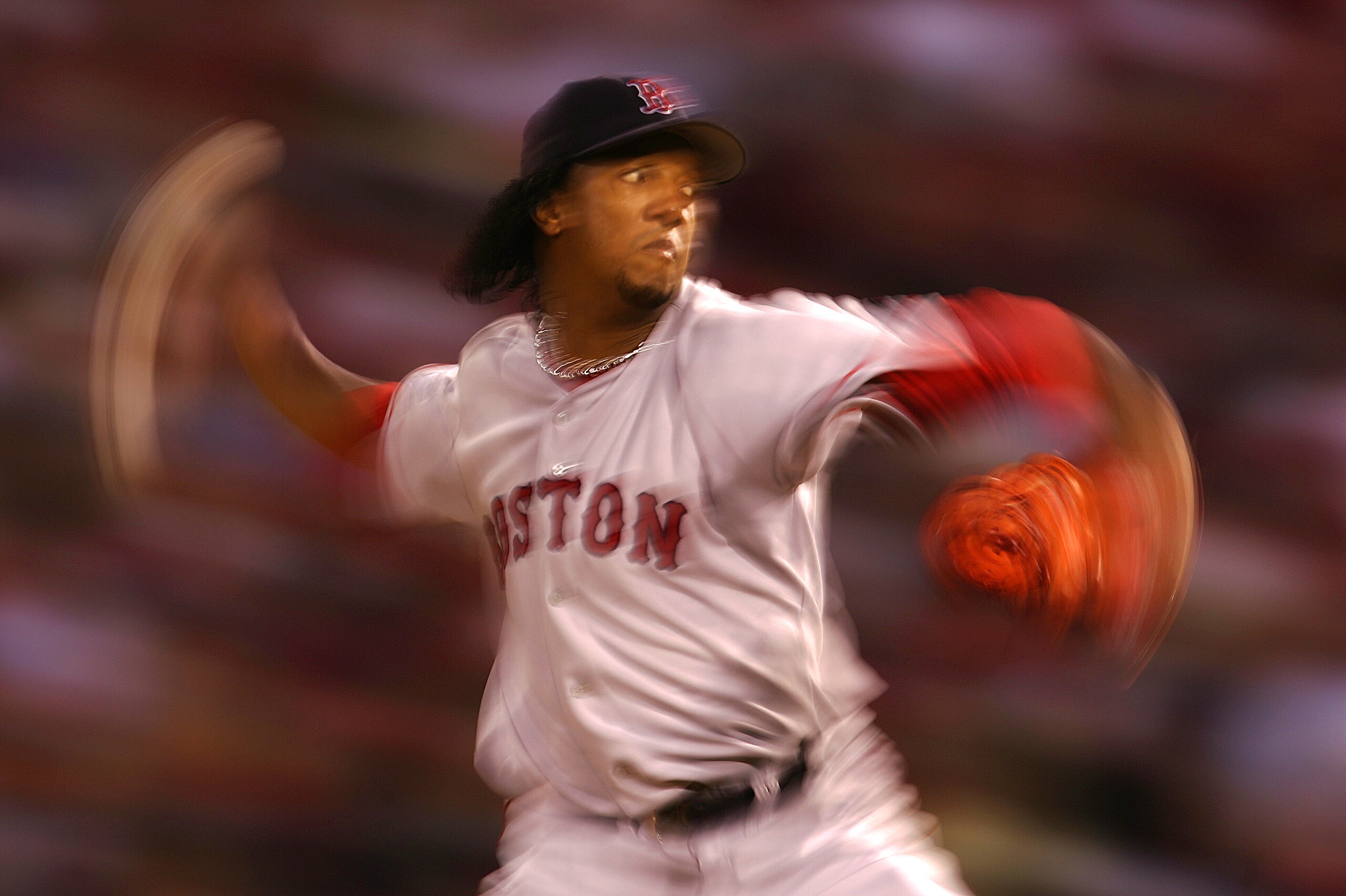ST LOUIS - OCTOBER 26:  Starting pitcher Pedro Martinez #45 of the Boston Red Sox throws a pitch against the St. Louis Cardinals during the first inning of game three of the World Series on October 26, 2004 at Busch Stadium in St. Louis, Missouri. (Photo