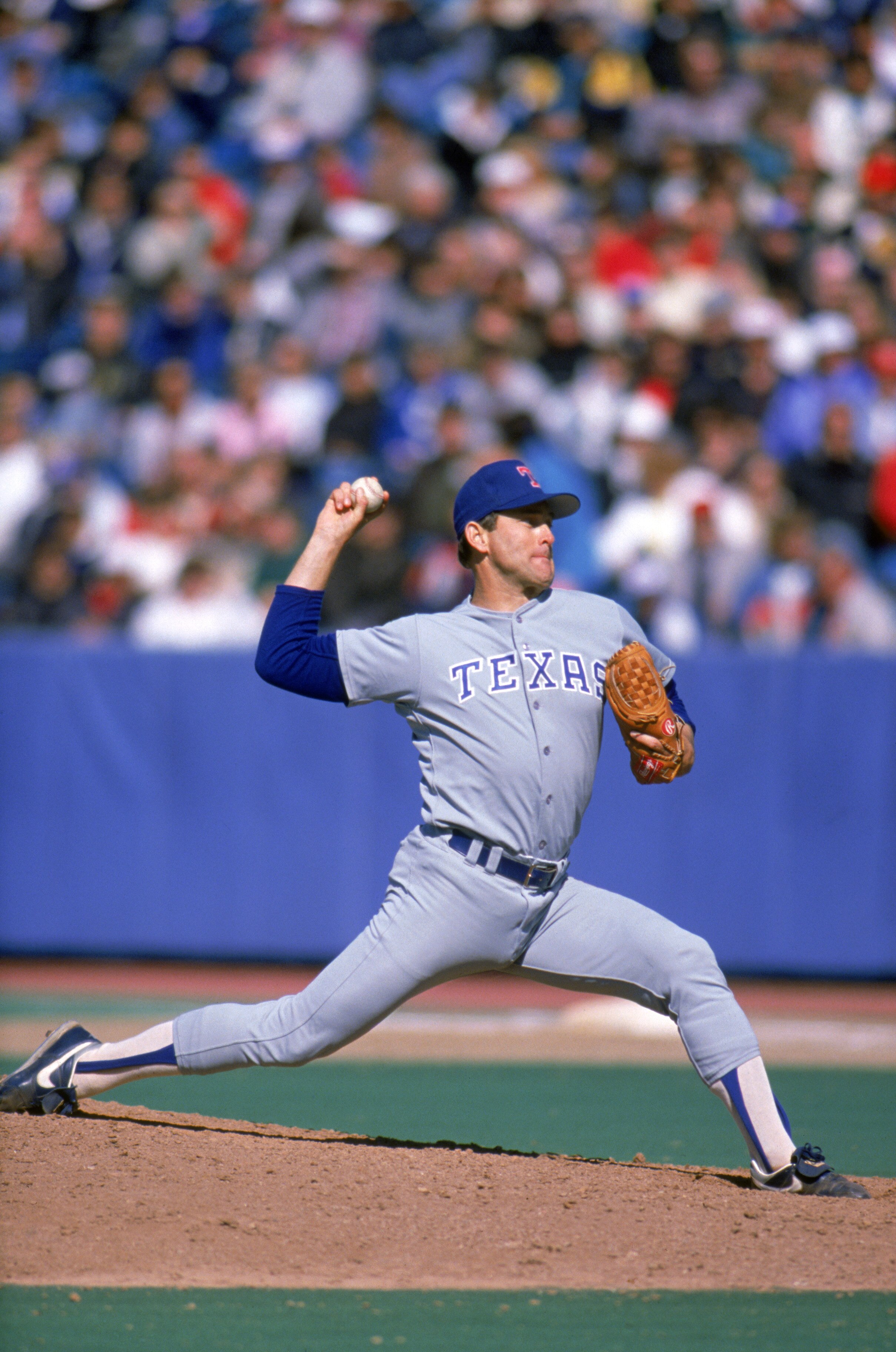 TORONTO - 1989:  Nolan Ryan #34 of the Texas Rangers pitches during the 1989 season against the Toronto Blue Jays at Skydome in Toronto, Ontario, Canada.  (Photo by Rick Stewart/Getty Images)