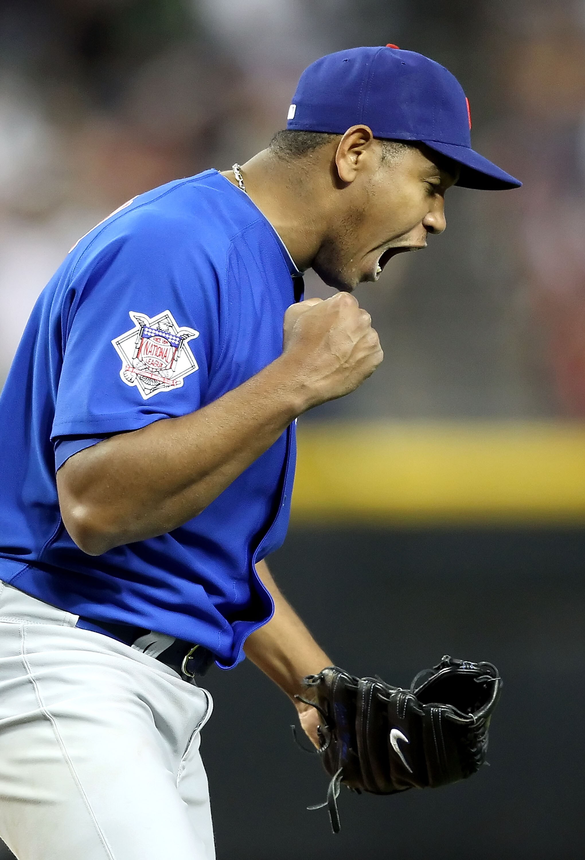 PHOENIX, AZ - APRIL 30:  Relief pitcher Carlos Marmol #49 of the Chicago Cubs celebrates after defeating the Arizona Diamondbacks in the Major League Baseball game at Chase Field on April 30, 2011 in Phoenix, Arizona.  The Cubs defeated the Diamondbacks 5