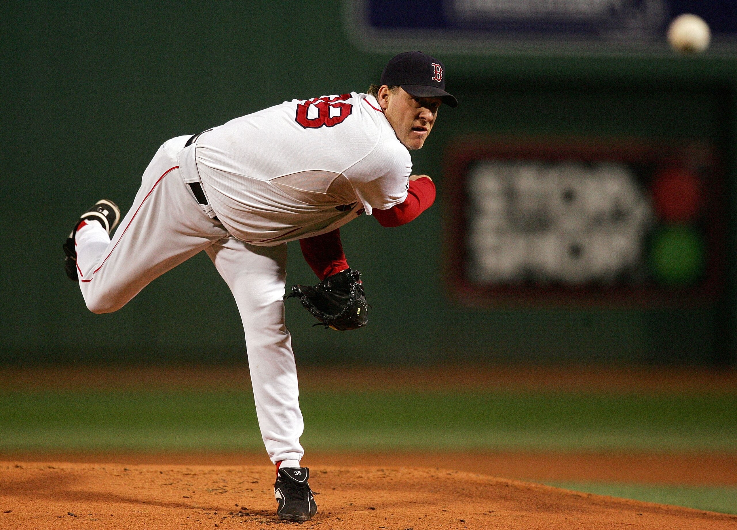 BOSTON - OCTOBER 25:  Curt Schilling #38 of the Boston Red Sox pitches against the Colorado Rockies during Game Two of the 2007 Major League Baseball World Series at Fenway Park on October 25, 2007 in Boston, Massachusetts.  (Photo by Jim McIsaac/Getty Im