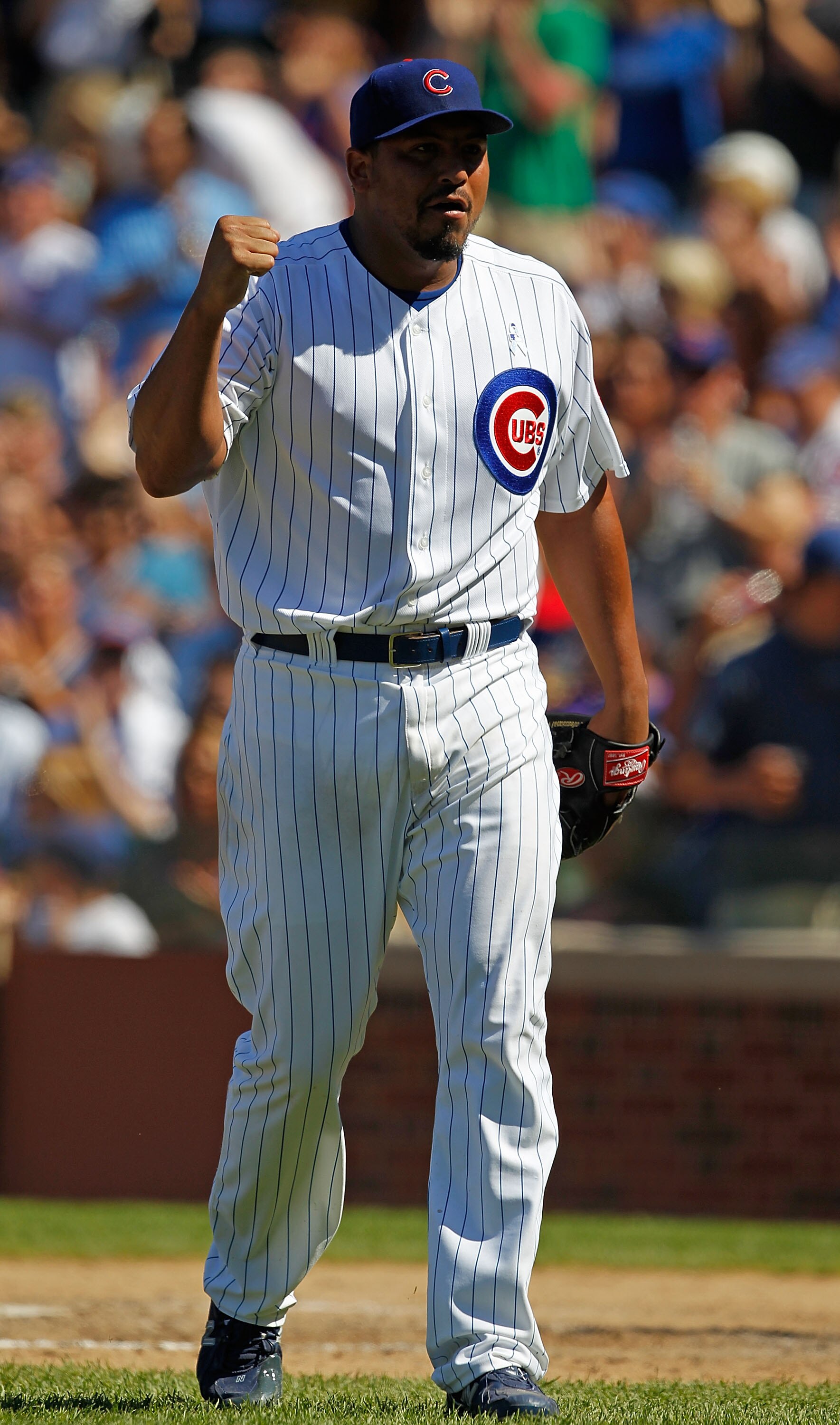 CHICAGO - JUNE 20: Carlos Zambrano #38 of the Chicago Cubs celebrates getting out of an inning-ending jam against the Los Angeles Angels of Anaheim at Wrigley Field on June 20, 2010 in Chicago, Illinois. The Cubs defeated the Angels 12-1. (Photo by Jonath