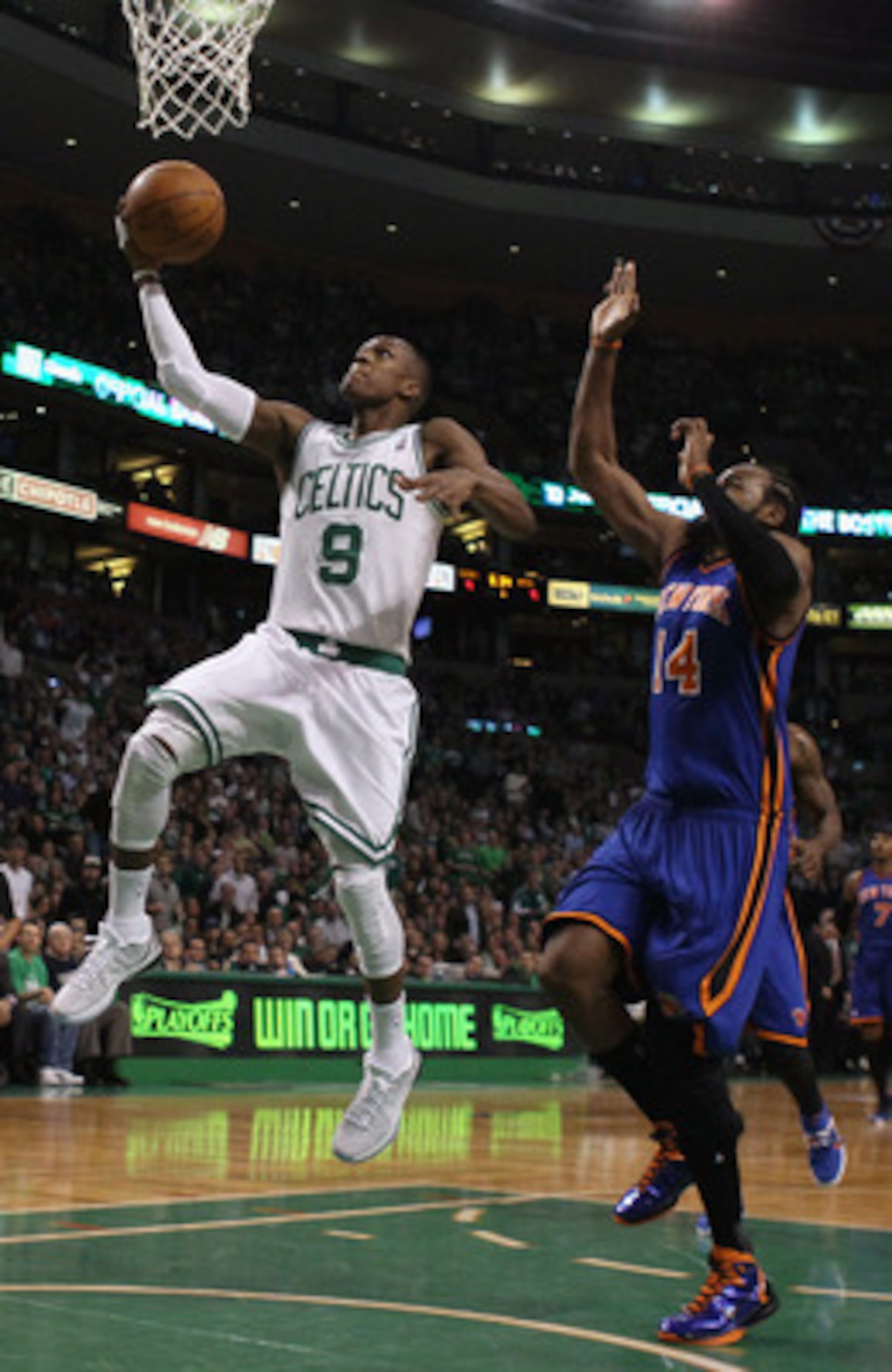 BOSTON, MA - APRIL 19:  Rajon Rondo #9 of the Boston Celtics heads for basket as Ronny Turiaf #14 of the New York Knicks defends in Game Two of the Eastern Conference Quarterfinals in the 2011 NBA Playoffs on April 19, 2011 at the TD Garden in Boston, Mas