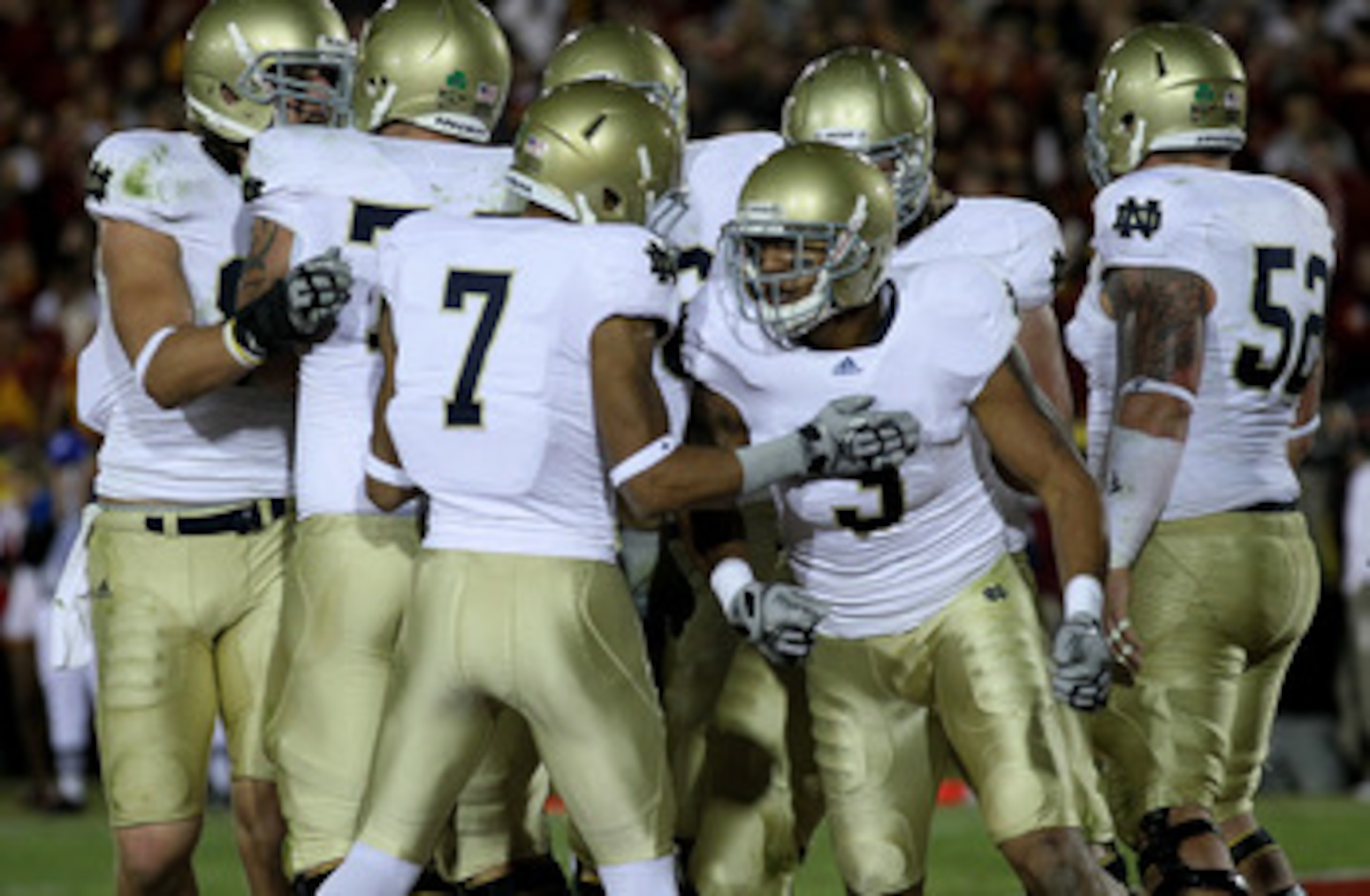 LOS ANGELES - NOVEMBER 27:  Wide receiver Michael Floyd #3 of the Notre Dame Fighting Irish celebrates with wide receiver T.J. Jones #7 after making a one yard touchdown catch against the USC Trojans at the Los Angeles Memorial Coliseum on November 27, 20