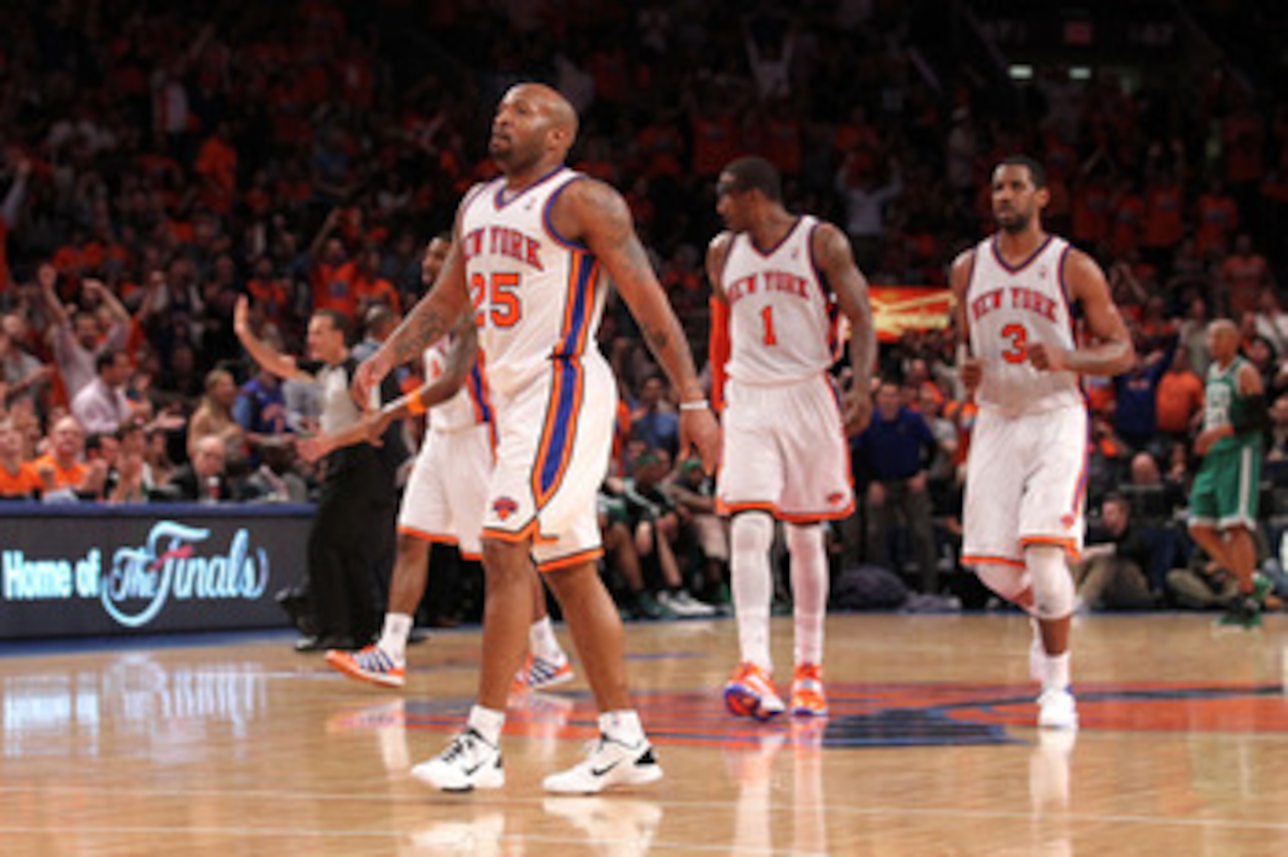 NEW YORK, NY - APRIL 24: (L-R) Anthony Carter #25, Amar'e Stoudemire #1 and Shawne Williams #3 of the New York Knicks walk up court against the Boston Celtics in Game Four of the Eastern Conference Quarterfinals during the 2011 NBA Playoffs on April 24, 2