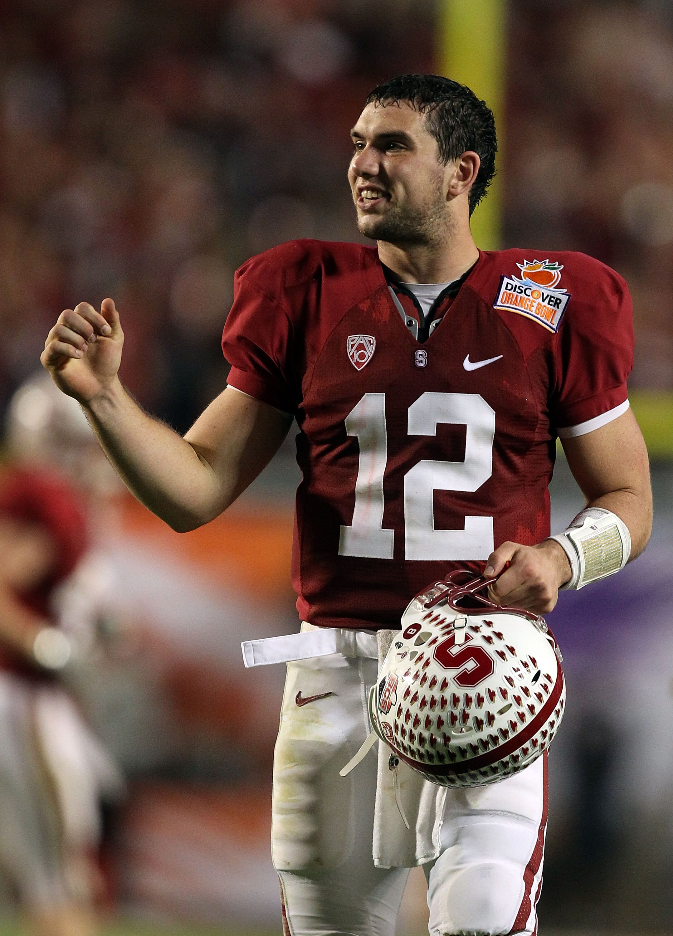 MIAMI, FL - JANUARY 03:  Quarterback Andrew Luck #12 of the Stanford Cardinal celebrates a play against the Virginia Tech Hokies during the 2011 Discover Orange Bowl at Sun Life Stadium on January 3, 2011 in Miami, Florida. Stanford won 40-12. (Photo by S