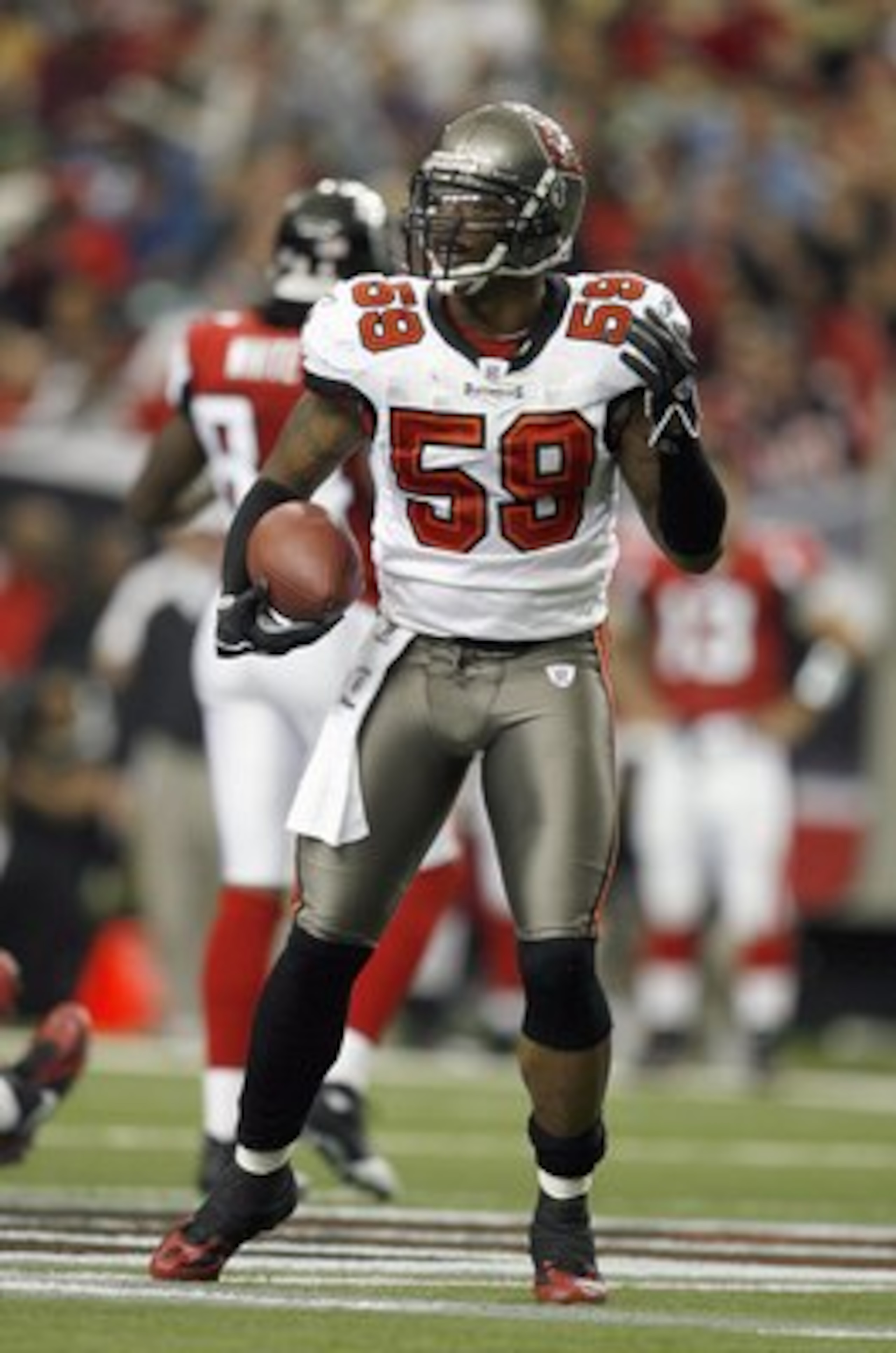 ATLANTA - NOVEMBER 18: Quincy Black #58 of the Tampa Bay Buccaneers looks on during the game against the Atlanta Falcons at Georgia Dome on November 18, 2007 in Atlanta, Georgia. Tampa Bay defeated Atlanta 31-7. (Photo by Kevin C. Cox/Getty Images)