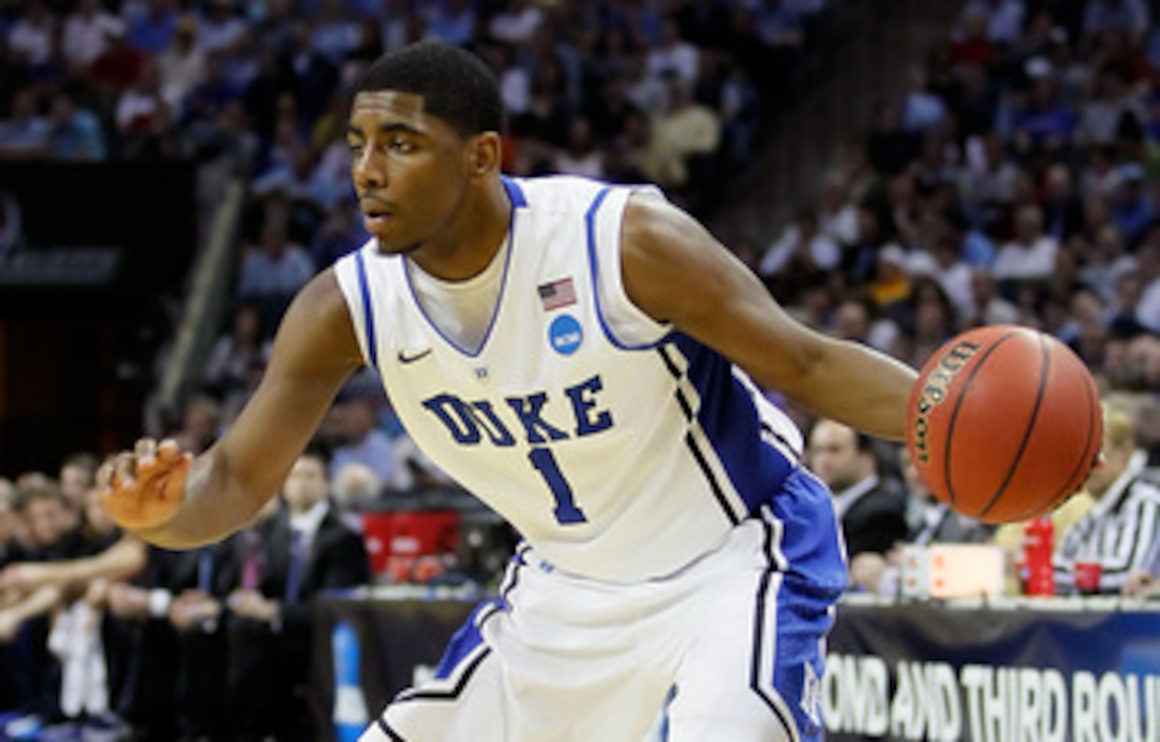 CHARLOTTE, NC - MARCH 20: Kyrie Irving #1 of the Duke Blue Devils moves the ball while taking on the Michigan Wolverines during the third round of the 2011 NCAA men's basketball tournament at Time Warner Cable Arena on March 20, 2011 in Charlotte, North CHARLOTTE, NC - MARCH 20: Kyrie Irving #1 of the Duke Blue Devils moves the ball while taking on the Michigan Wolverines during the third round of the 2011 NCAA men's basketball tournament at Time Warner Cable Arena on March 20, 2011 in Charlotte, North