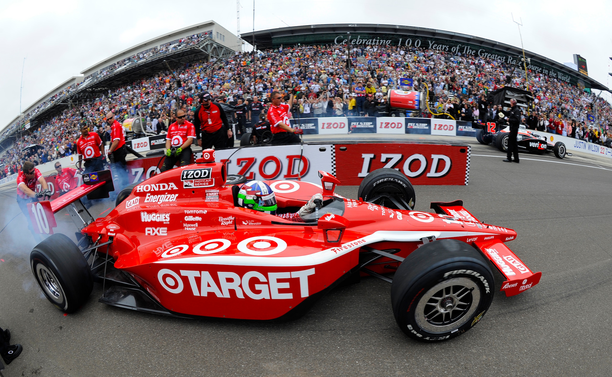 INDIANAPOLIS, IN - MAY 27:  Dario Franchitti of Scotland, driver of the #10 Target Chip Ganassi Racing Dallara Honda, competes during the IZOD Pit Stop Challenge on Carb Day for the 95th running of the Indianapolis 500 on May 27, 2011 at the Indianapolis