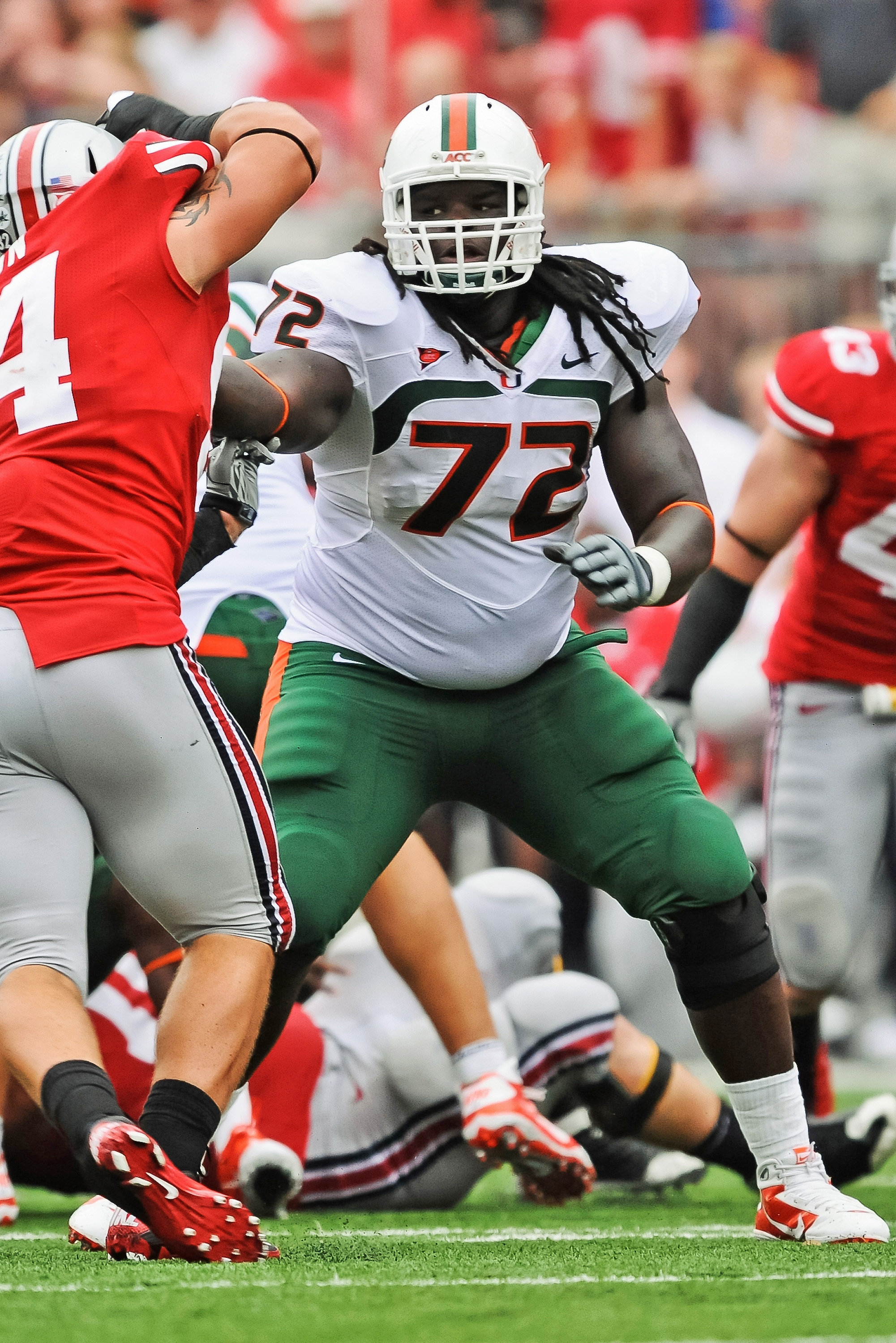 COLUMBUS, OH - SEPTEMBER 11:  Brandon Washington #72 of the Miami Hurricanes runs blocks against the Ohio State Buckeyes at Ohio Stadium on September 11, 2010 in Columbus, Ohio.  (Photo by Jamie Sabau/Getty Images)