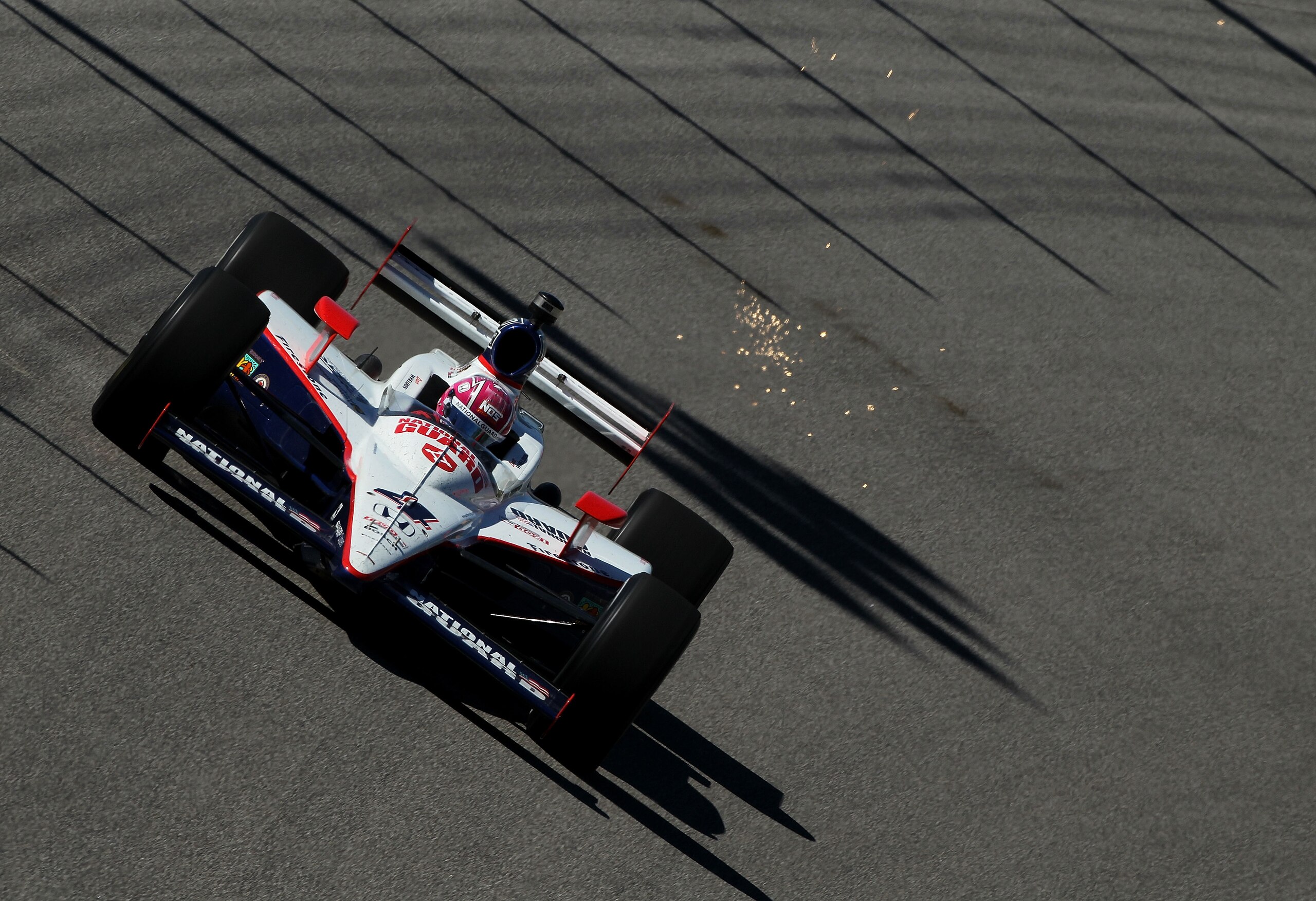 HOMESTEAD, FL - OCTOBER 01: Dan Wheldon of Great Britain, drives the #4 National Guard Panther Racing Dallara Honda during practice for the IZOD IndyCar Series NextEra Energy Indy Championships at Homestead-Miami Speedway on October 1, 2010 in Homestead,