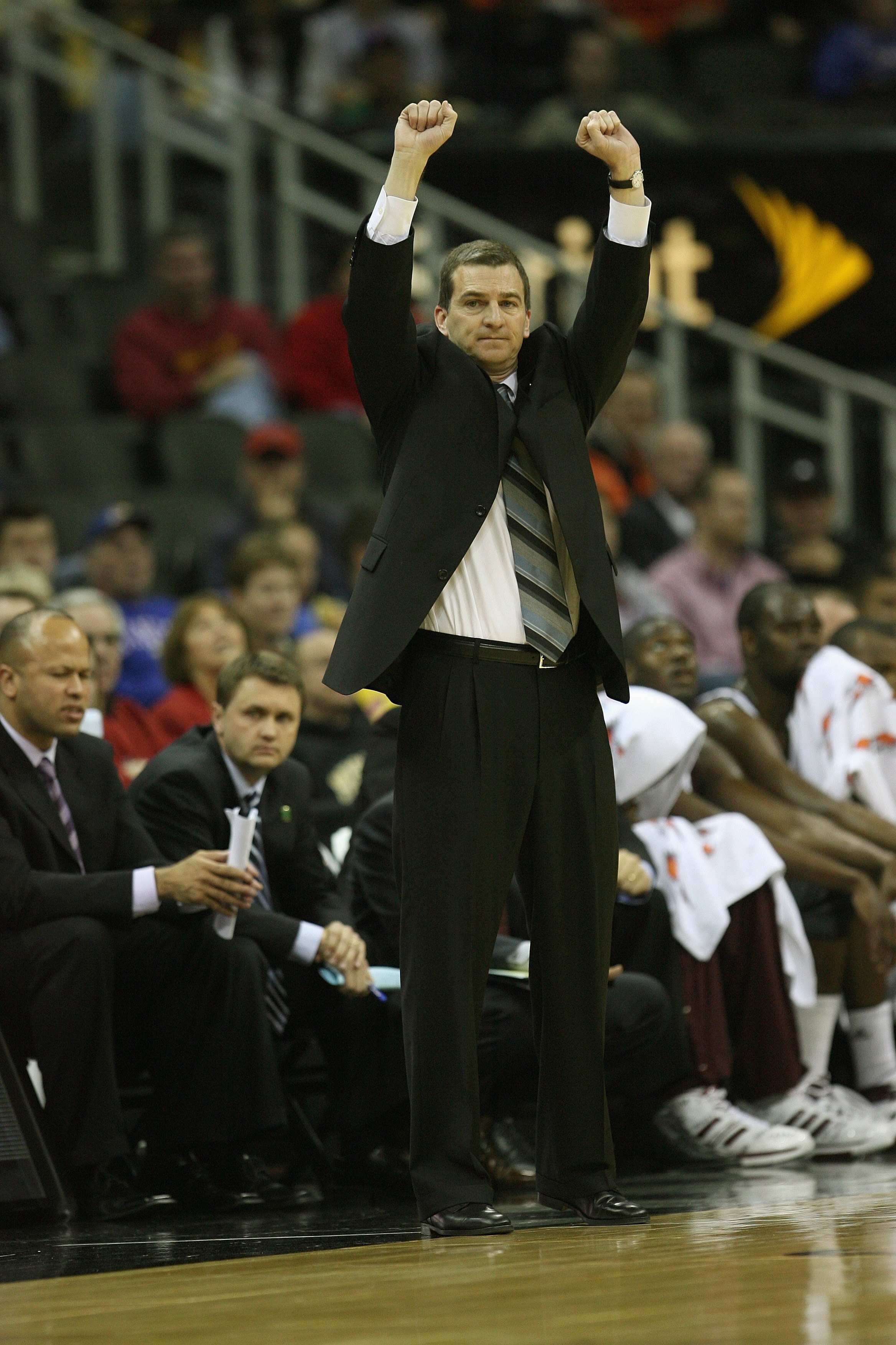 KANSAS CITY, MO - MARCH 13:  Head coach Mark Turgeon of the Texas A&M Aggies raises his arms during the game against the Iowa State Cyclones during day 1 of the Big 12 Men's Basketball Tournament on March 13, 2008 at the Sprint Center in Kansas City, Miss