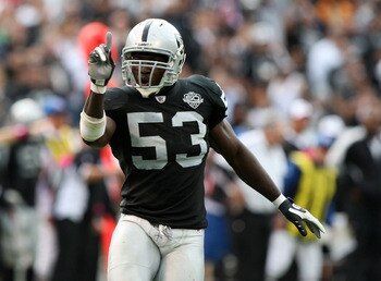 OAKLAND, CA - OCTOBER 18:  Thomas Howard #53 of the Oakland Raiders celebrates after a play against the Philadelphia Eagles during an NFL game at the Oakland-Alameda County Coliseum on October 18, 2009 in Oakland, California.  (Photo by Jed Jacobsohn/Gett