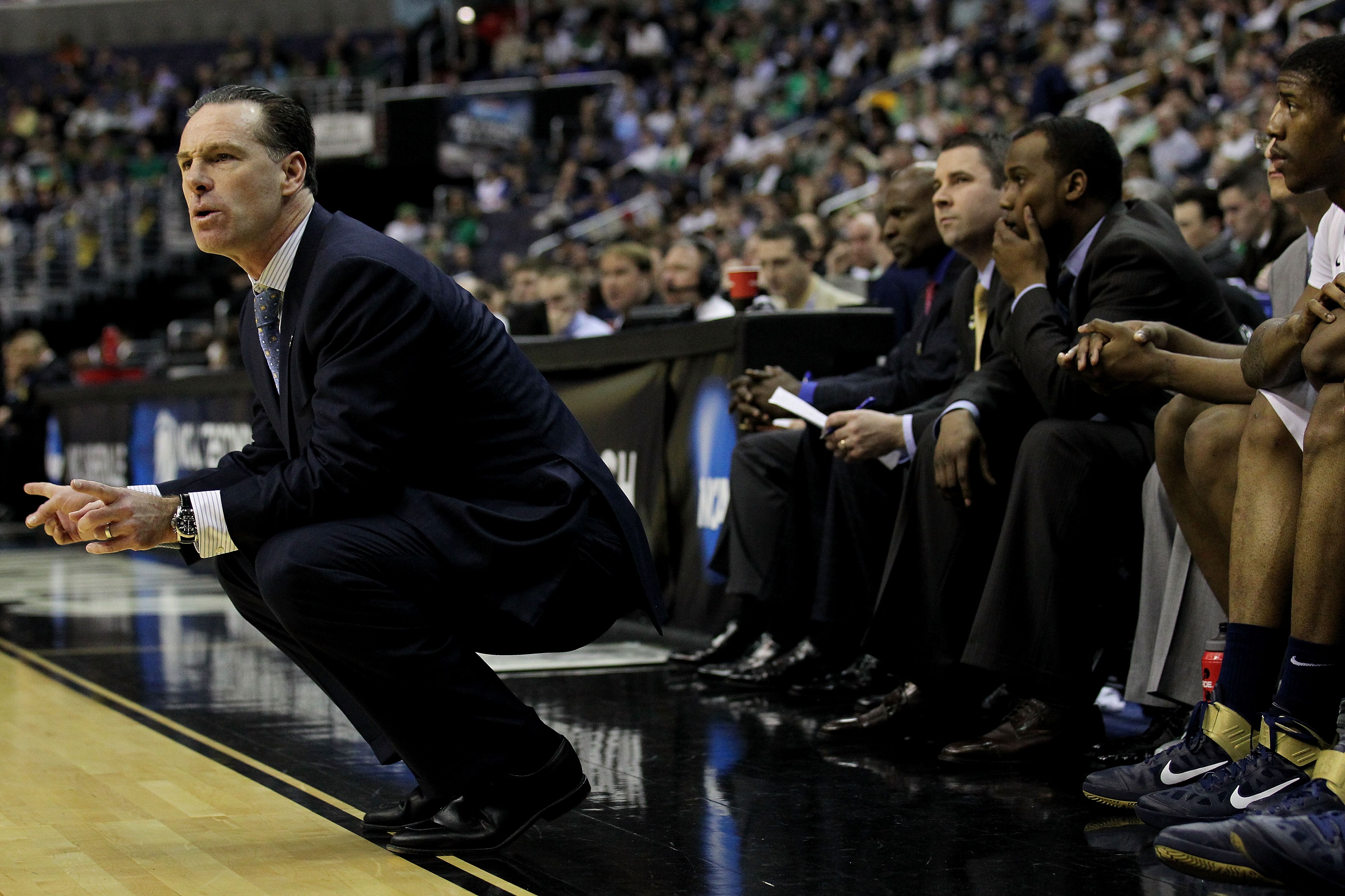 WASHINGTON - MARCH 17:  Head coach of the Pittsburgh Panthers Jamie Dixon, shouts from the bench during their game against the North Carolina-Asheville Bulldogs during the second round of the 2011 NCAA men's basketball tournament at the Verizon Center on