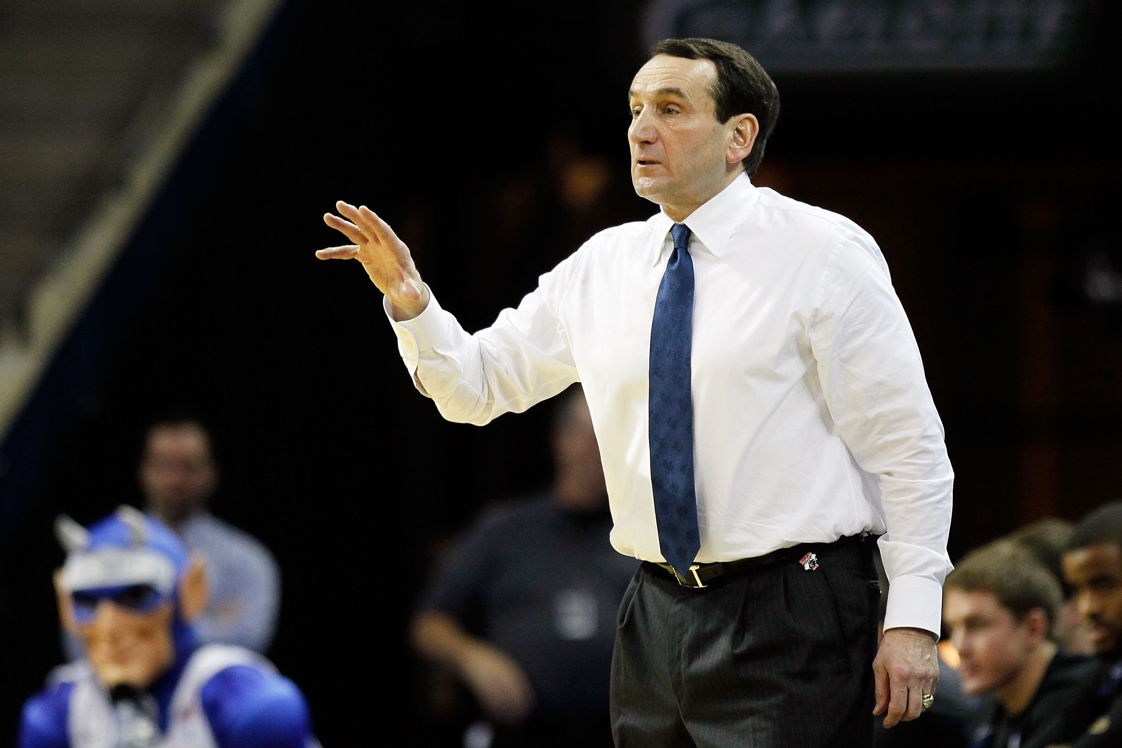 CHARLOTTE, NC - MARCH 20:  Head coach Mike Krzyzewski of the Duke Blue Devils reacts in the second half while taking on the Michigan Wolverines during the third round of the 2011 NCAA men's basketball tournament at Time Warner Cable Arena on March 20, 201