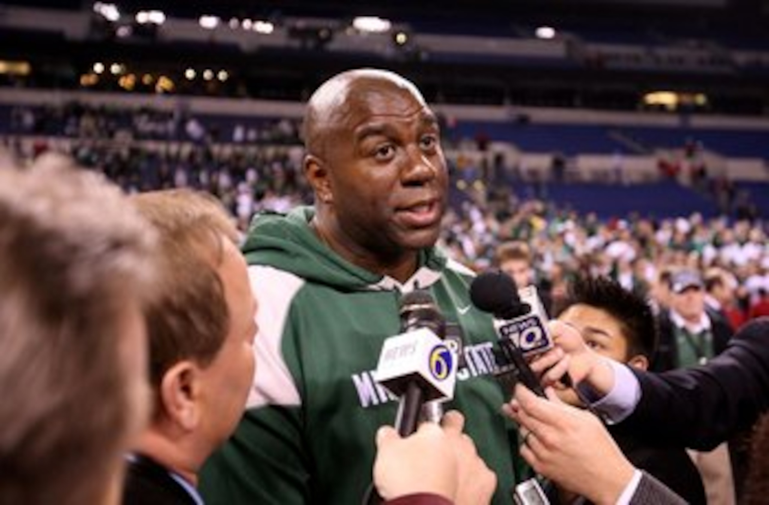 INDIANAPOLIS - MARCH 29:  Former Michigan State player Earvin Magic Johnson is interviewed by the media following the Michigan State Spartans' 64-52 win against the Louisville Cardinals during the fourth round of the NCAA Division I Men's Basketball Tourn