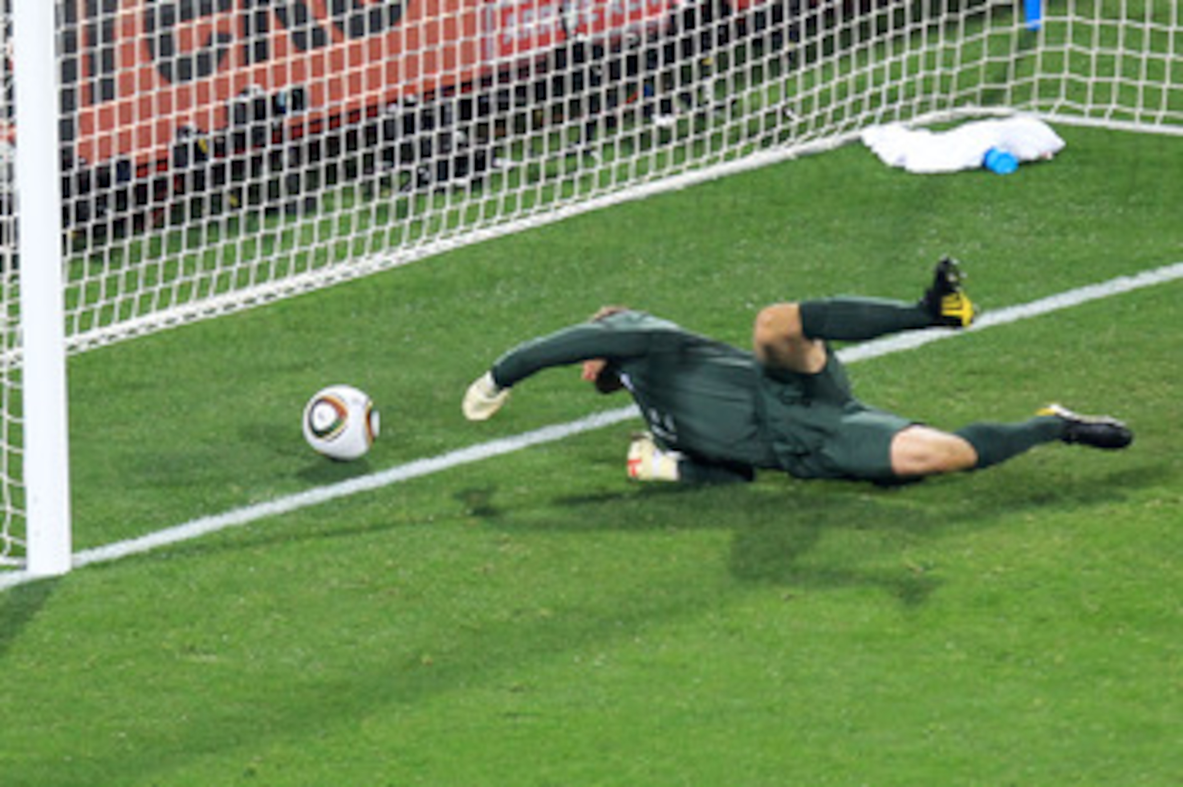 RUSTENBURG, SOUTH AFRICA - JUNE 12:  Robert Green of England misjudges the ball and lets in a goal during the 2010 FIFA World Cup South Africa Group C match between England and USA at the Royal Bafokeng Stadium on June 12, 2010 in Rustenburg, South Africa