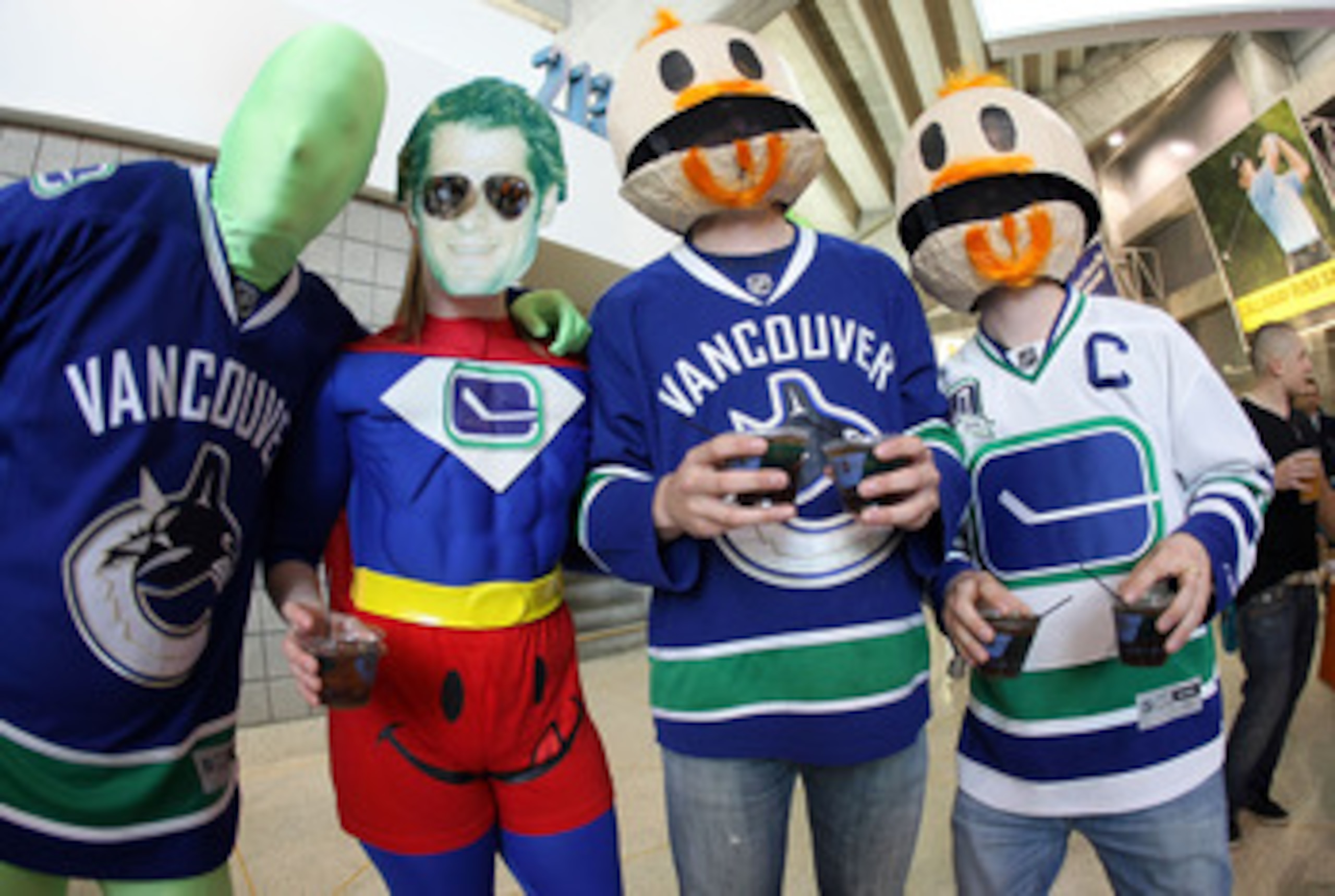 SAN JOSE, CA - MAY 20:  Fans of the Vancouver Canucks in costume show their support prior to Game Three of the Western Conference Finals between the Vancouver Canucks and the San Jose Sharks during the 2011 Stanley Cup Playoffs at HP Pavilion on May 20, 2