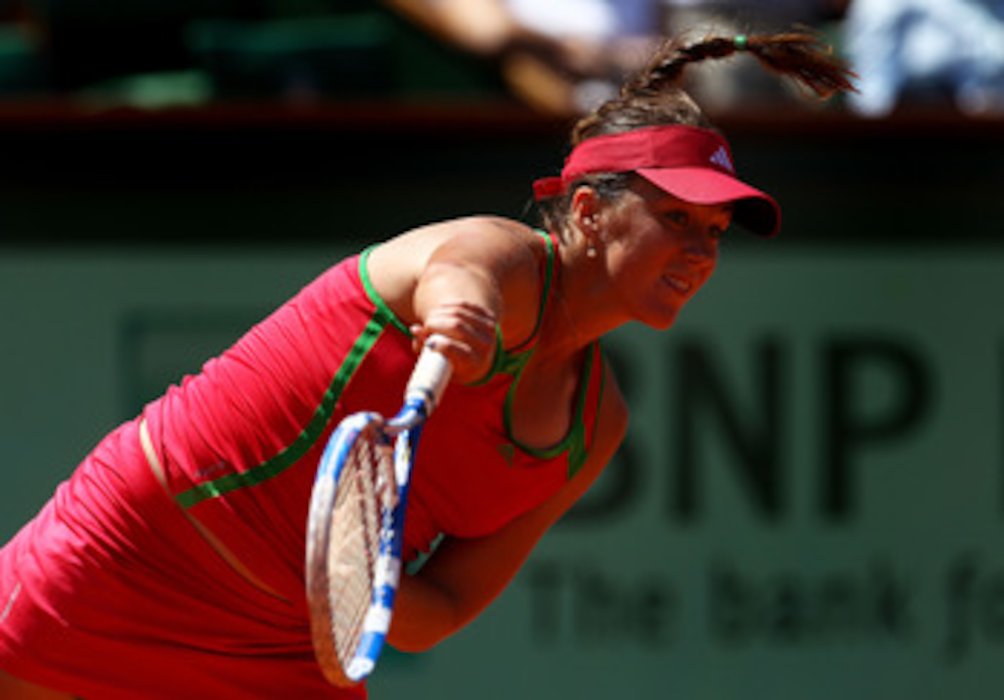 PARIS, FRANCE - MAY 29:  Anastasia Pavlyuchenkova of Russia serves during the women's singles round four match between Vera Zvonareva of Russia and Anastasia Pavlyuchenkova of Russia on day eight of the French Open at Roland Garros on May 29, 2011 in Pari