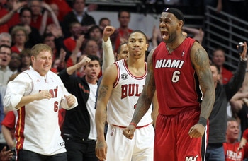 CHICAGO, IL - MAY 26:  LeBron James #6 of the Miami Heat celebrates after the Heat won 83-80 against Derrick Rose #1 of the Chicago Bulls in Game Five of the Eastern Conference Finals during the 2011 NBA Playoffs on May 26, 2011 at the United Center in Ch