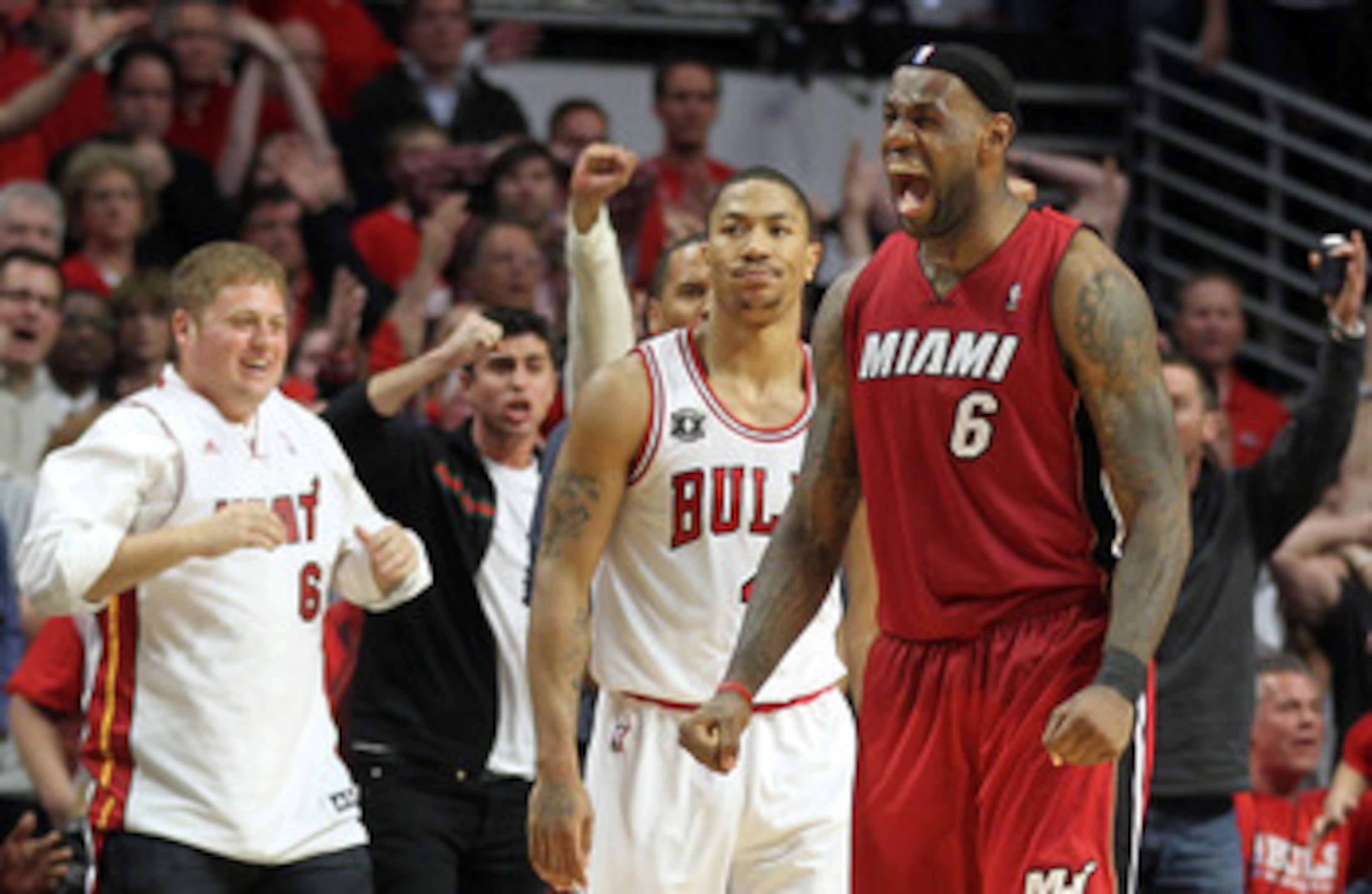 CHICAGO, IL - MAY 26:  LeBron James #6 of the Miami Heat celebrates after the Heat won 83-80 against Derrick Rose #1 of the Chicago Bulls in Game Five of the Eastern Conference Finals during the 2011 NBA Playoffs on May 26, 2011 at the United Center in Ch