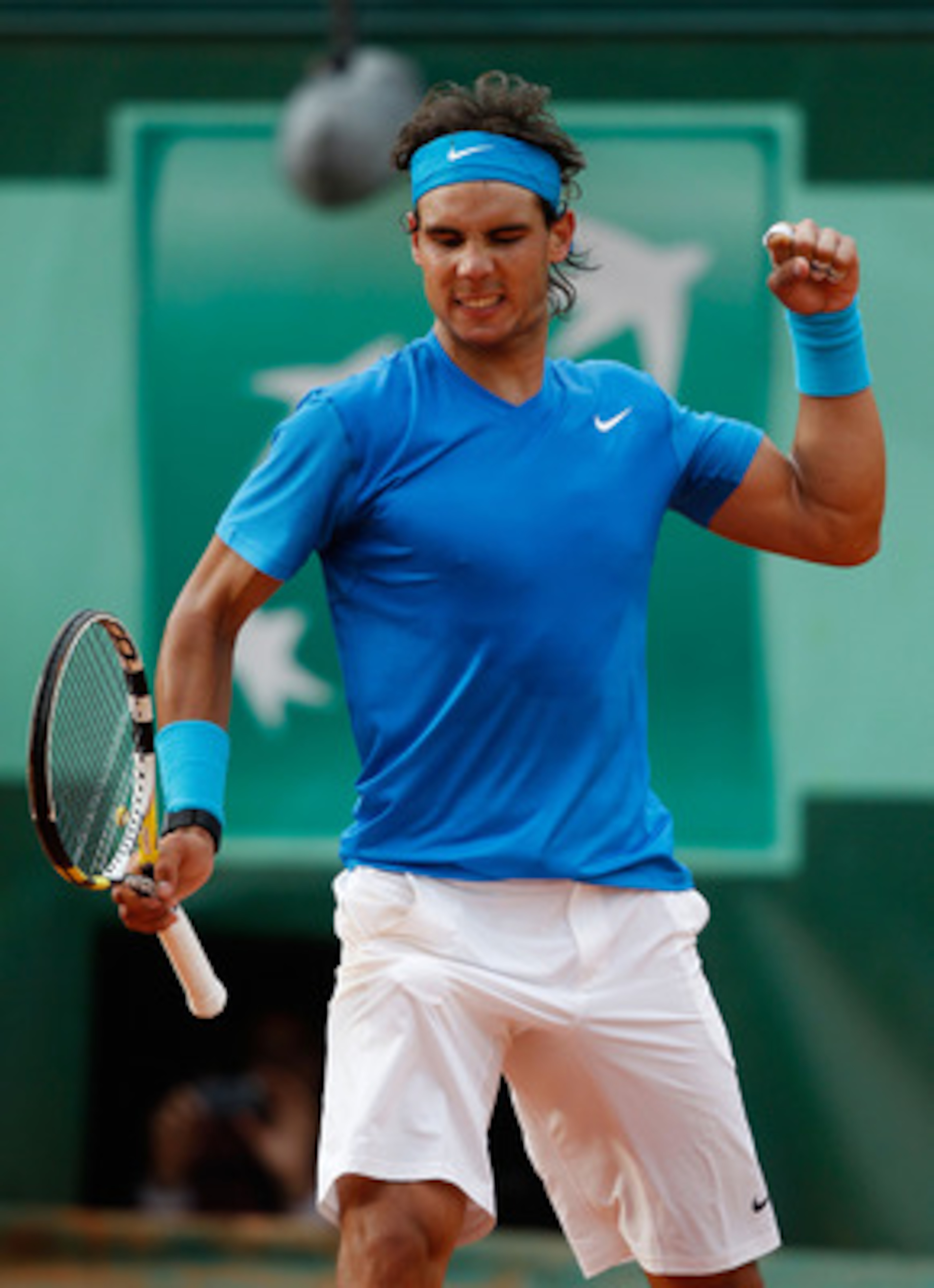 PARIS, FRANCE - MAY 26:  Rafael Nadal of Spain celebrates following his victory during the men's singles round two match between Rafael Nadal of Spain and Pablo Andujar of Spain on day five of the French Open at Roland Garros on May 26, 2011 in Paris, Fra