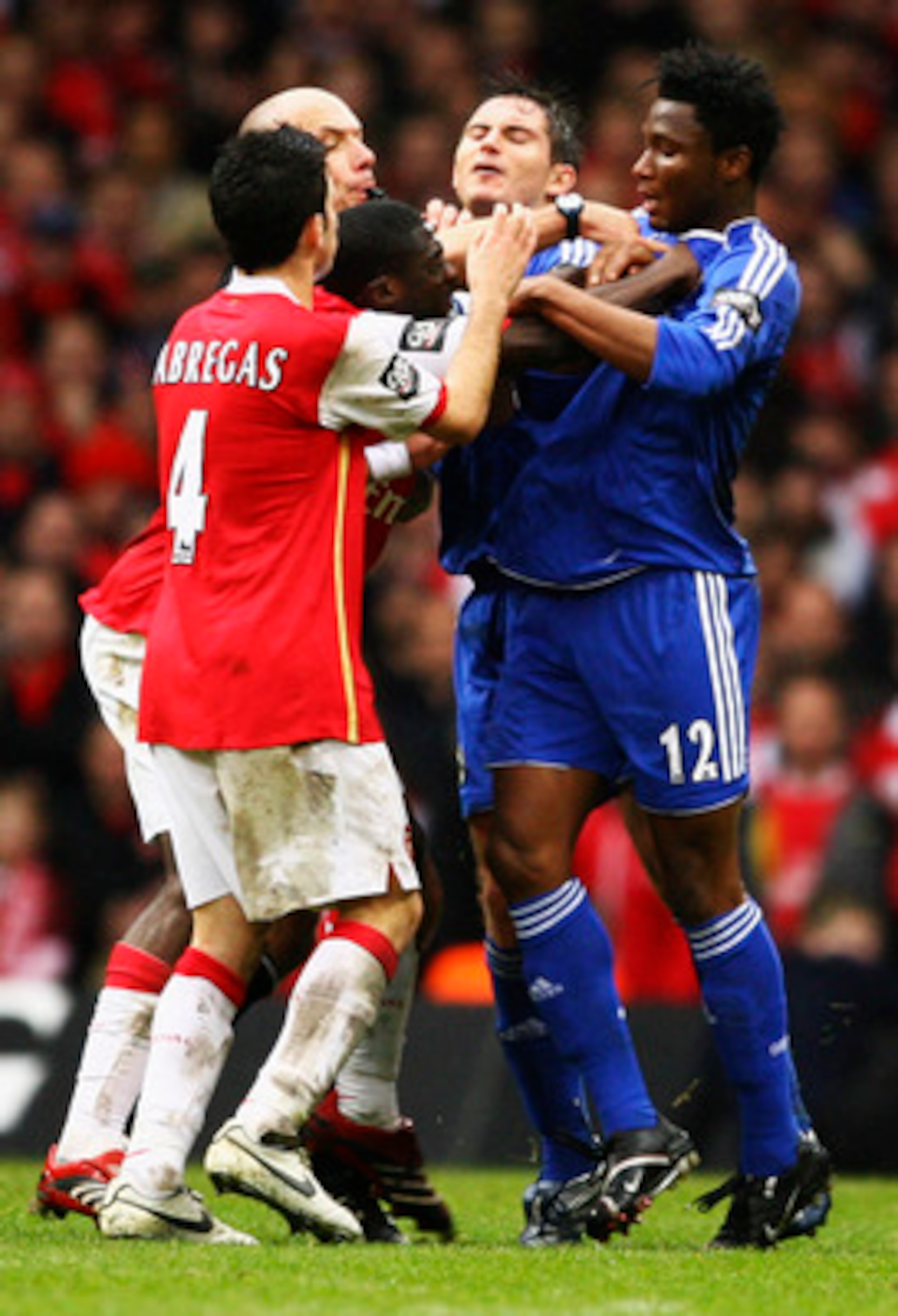 CARDIFF, UNITED KINGDOM - FEBRUARY 25:  Referee Howard Webb attempts to break up a brawl between the Arsenal and Chelsea players during the Carling Cup Final match between Chelsea and Arsenal at the Millennium Stadium on February 25, 2007 in Cardiff, Wale