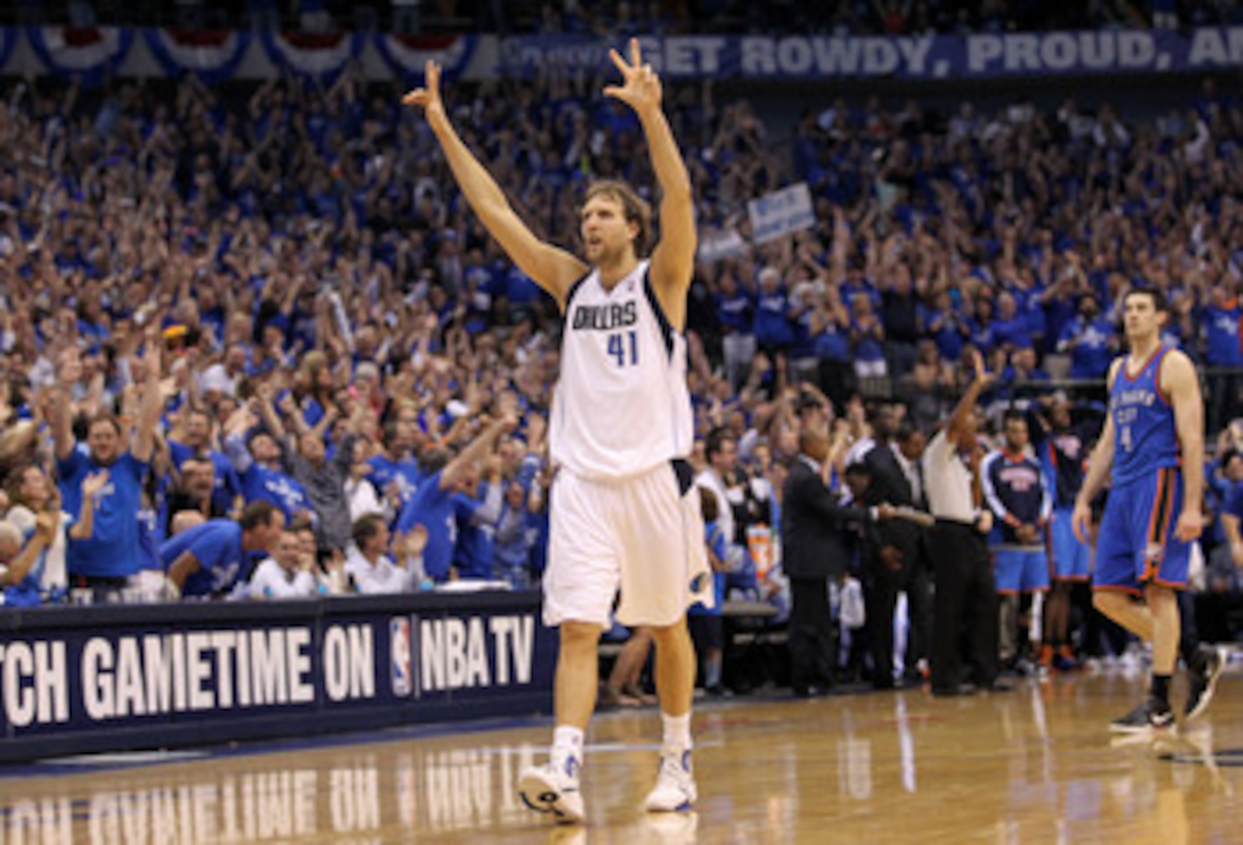DALLAS, TX - MAY 25:  Dirk Nowitzki #41 of the Dallas Mavericks reacts after making a three-pointer in the fourth quarter while taking on the Oklahoma City Thunder in Game Five of the Western Conference Finals during the 2011 NBA Playoffs at American Airl