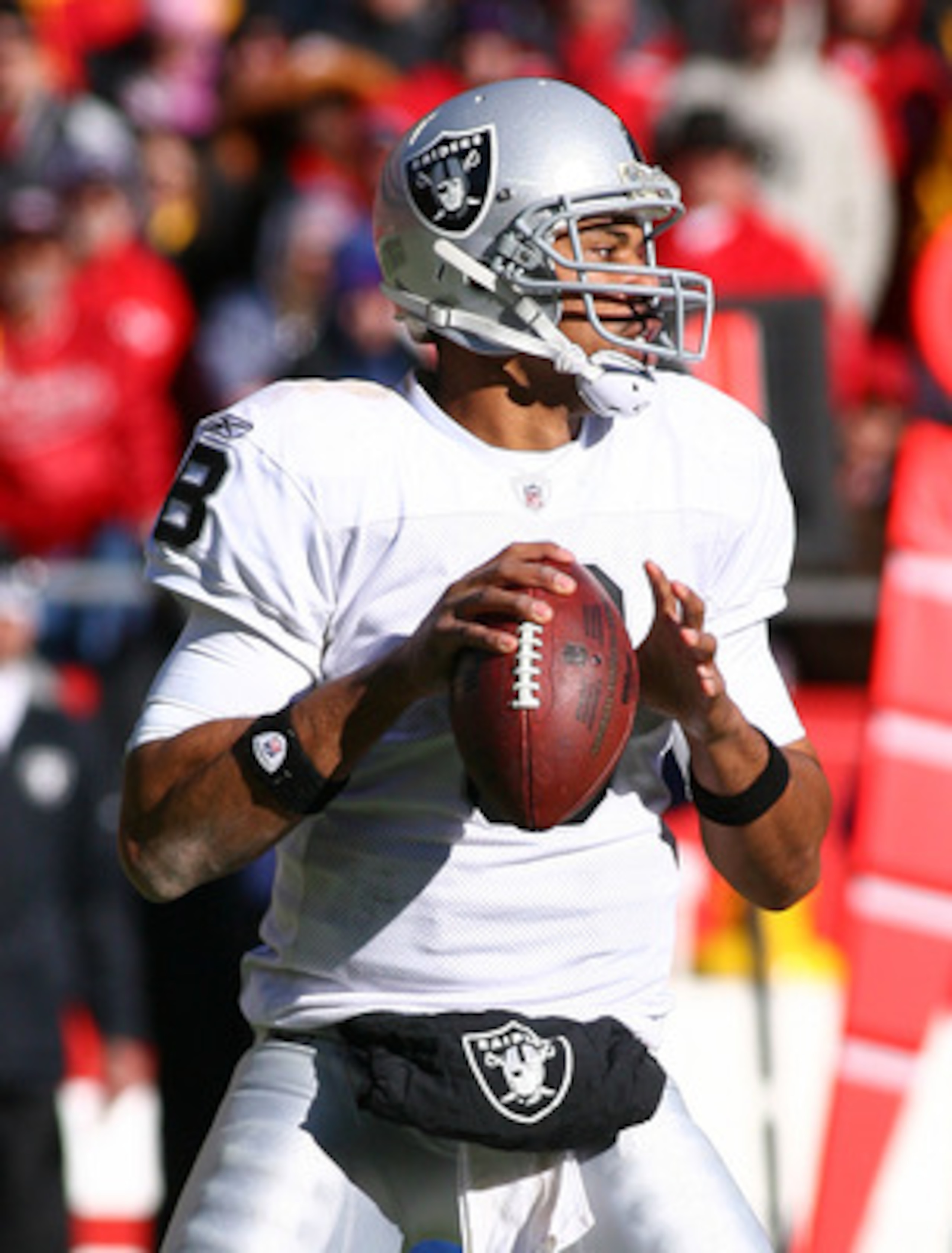 KANSAS CITY, MO - JANUARY 02: Quarterback Jason Campbell #8 of the Oakland Raiders drops back to pass in a game against the Kansas City Chiefs at Arrowhead Stadium on January 2, 2011 in Kansas City, Missouri. (Photo by Tim Umphrey/Getty Images) KANSAS CITY, MO - JANUARY 02: Quarterback Jason Campbell #8 of the Oakland Raiders drops back to pass in a game against the Kansas City Chiefs at Arrowhead Stadium on January 2, 2011 in Kansas City, Missouri. (Photo by Tim Umphrey/Getty Images)