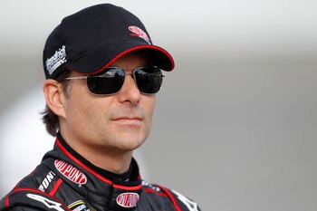 RICHMOND, VA - APRIL 29:  Jeff Gordon, driver of the #24 DuPont Chevrolet, stands on pit road during qualifying for the NASCAR Sprint Cup Series Crown Royal Presents The Matthew & Daniel Hansen 400 at Richmond International Raceway on April 29, 2011 in Ri