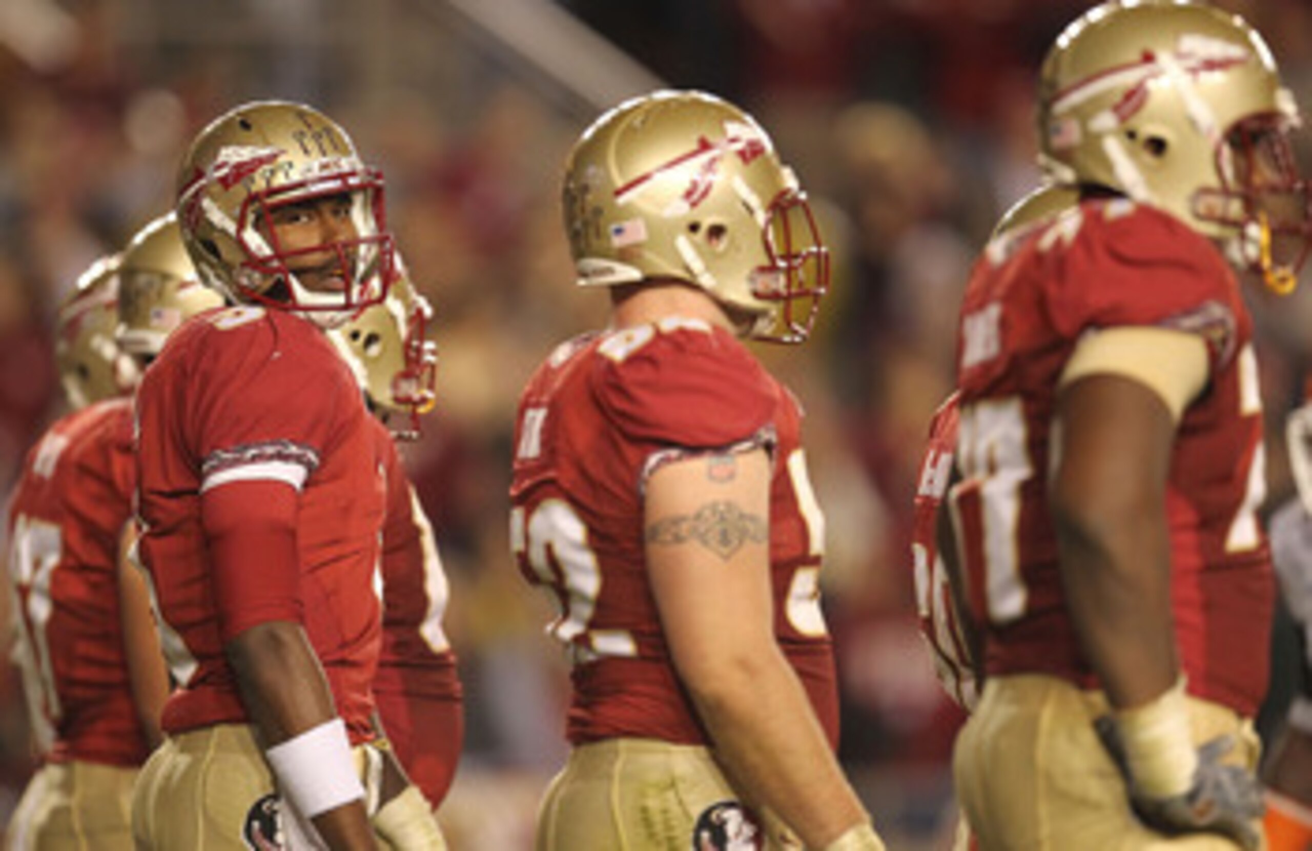TALLAHASSEE, FL - NOVEMBER 27:  E.J. Manuel #3 of the Florida State Seminoles looks for a play from the sidelines during a game against the Florida Gators at Doak Campbell Stadium on November 27, 2010 in Tallahassee, Florida.  (Photo by Mike Ehrmann/Getty