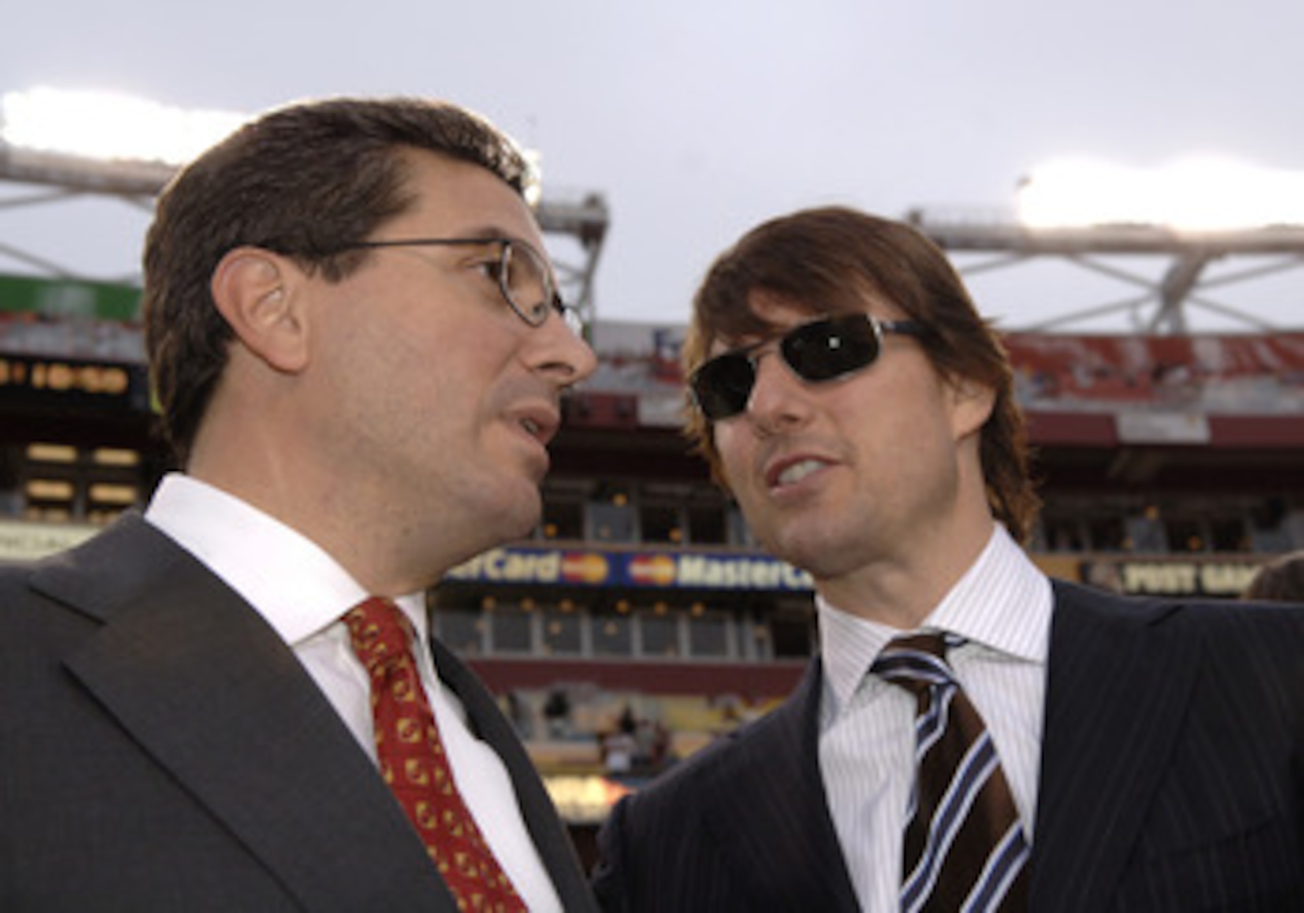 Washington Redskins owner Daniel Snyder with actor Tom Cruise on the sidelines before  the Washington Redskins host the Minnesota Vikings  on ESPN Monday Night Football September 11, 2006 in Washington.  The Vikings won 19 - 16.  (Photo by Al Messerschmid