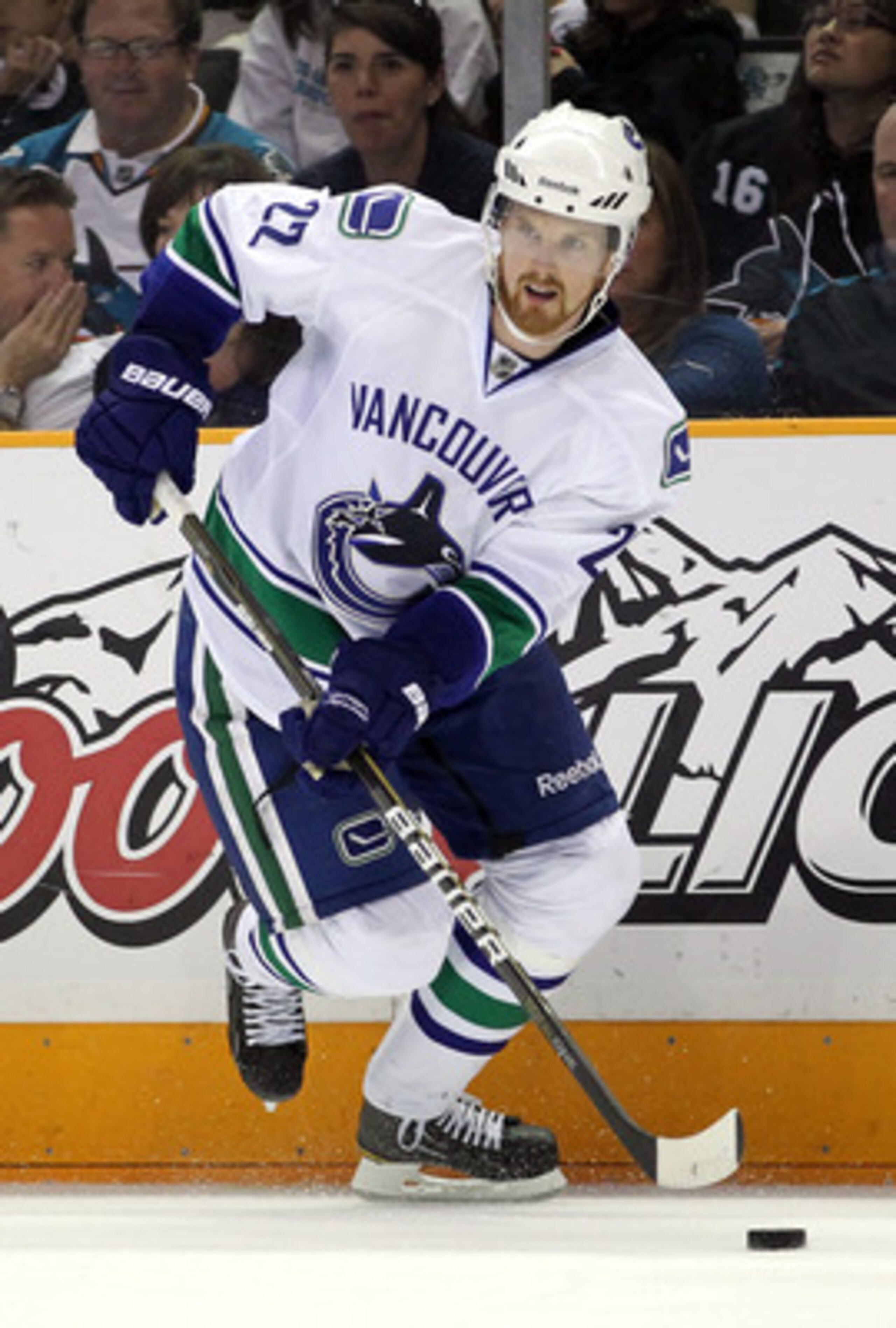 SAN JOSE, CA - MAY 22:  Daniel Sedin #22 of the Vancouver Canucks looks to make a play from the wing with the puck during Game Four of the Western Conference Finals against the San Jose Sharks during the 2011 Stanley Cup Playoffs at HP Pavilion on May 22,