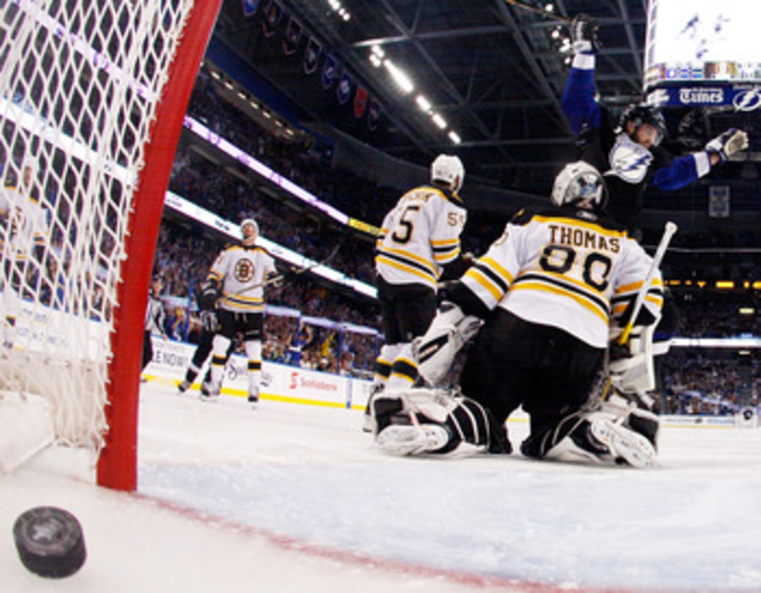 TAMPA, FL - MAY 25:  Teddy Purcell #16 of the Tampa Bay Lightning scores a first period goal past Tim Thomas #30 of the Boston Bruins in Game Six of the Eastern Conference Finals during the 2011 NHL Stanley Cup Playoffs at St Pete Times Forum on May 25, 2