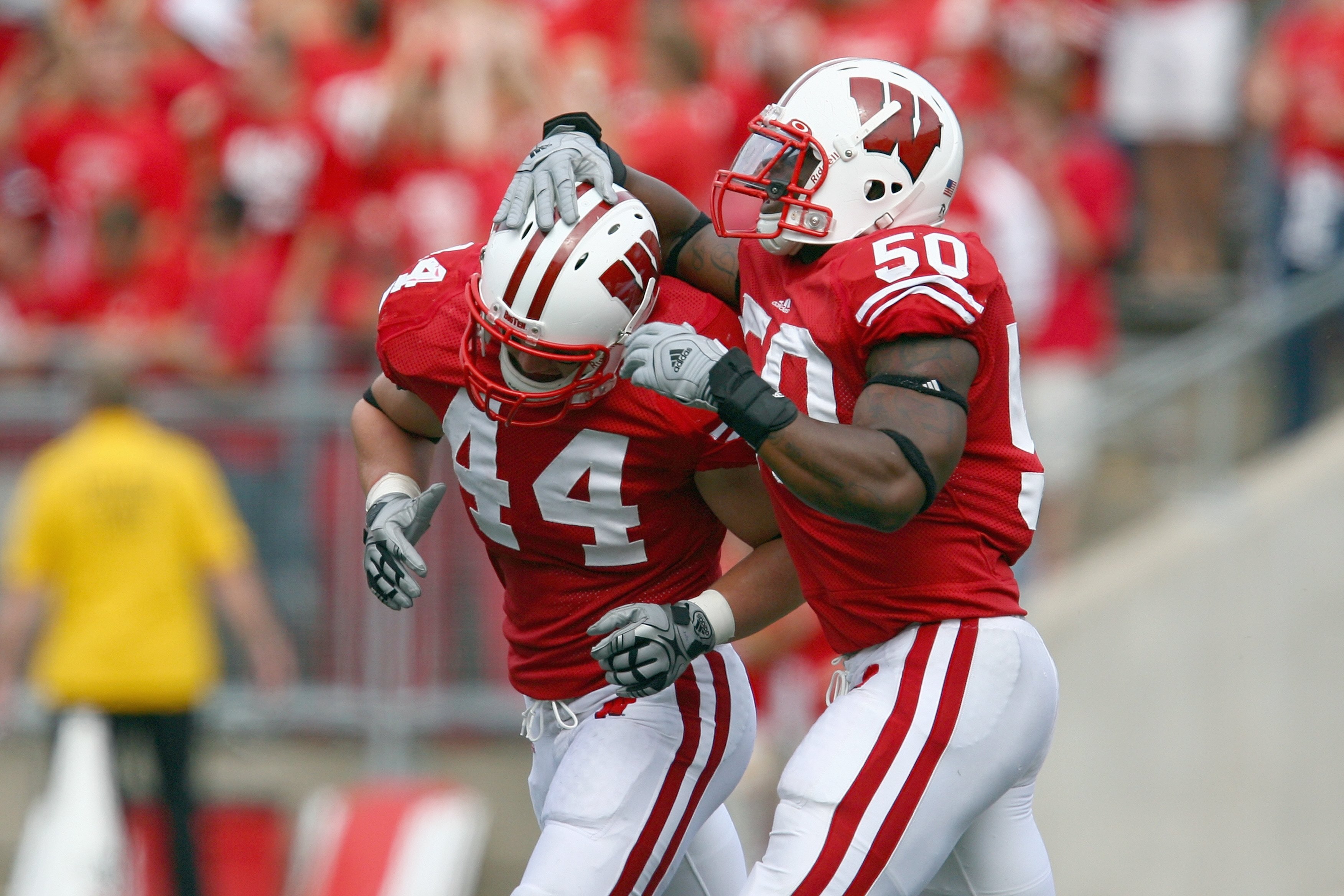 MADISON, WI - SEPTEMBER 26: O'Brien Schofield #50 of the Wisconsin Badgers celebrates with Chris Borland #44 against the Michigan State Spartans on September 26, 2009 at Camp Randall Stadium in Madison, Wisconsin. (Photo by Jonathan Daniel/Getty Images)