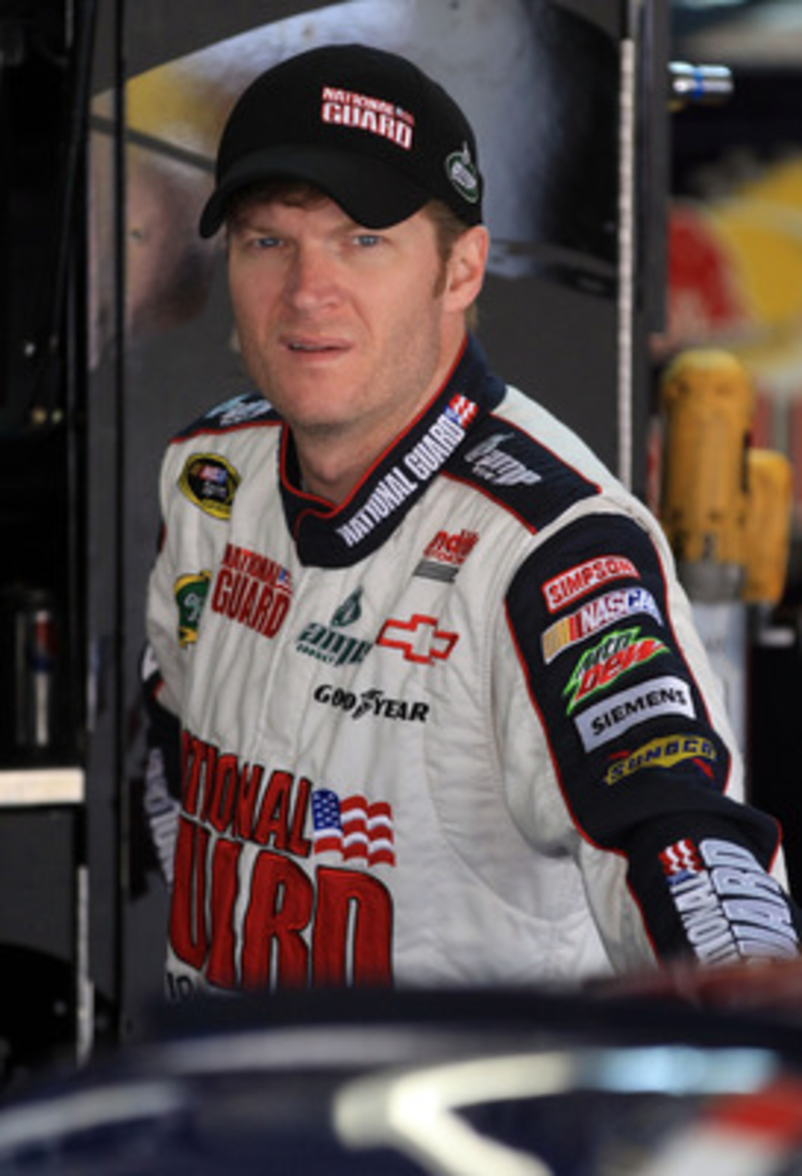 CHARLOTTE, NC - MAY 28:  Dale Earnhardt Jr., driver of the #88 National Guard/Amp Energy Chevrolet, stands by his car during practice for the NASCAR Sprint Cup Series Coca-Cola 600 at Charlotte Motor Speedway on May 28, 2011 in Charlotte, North Carolina.