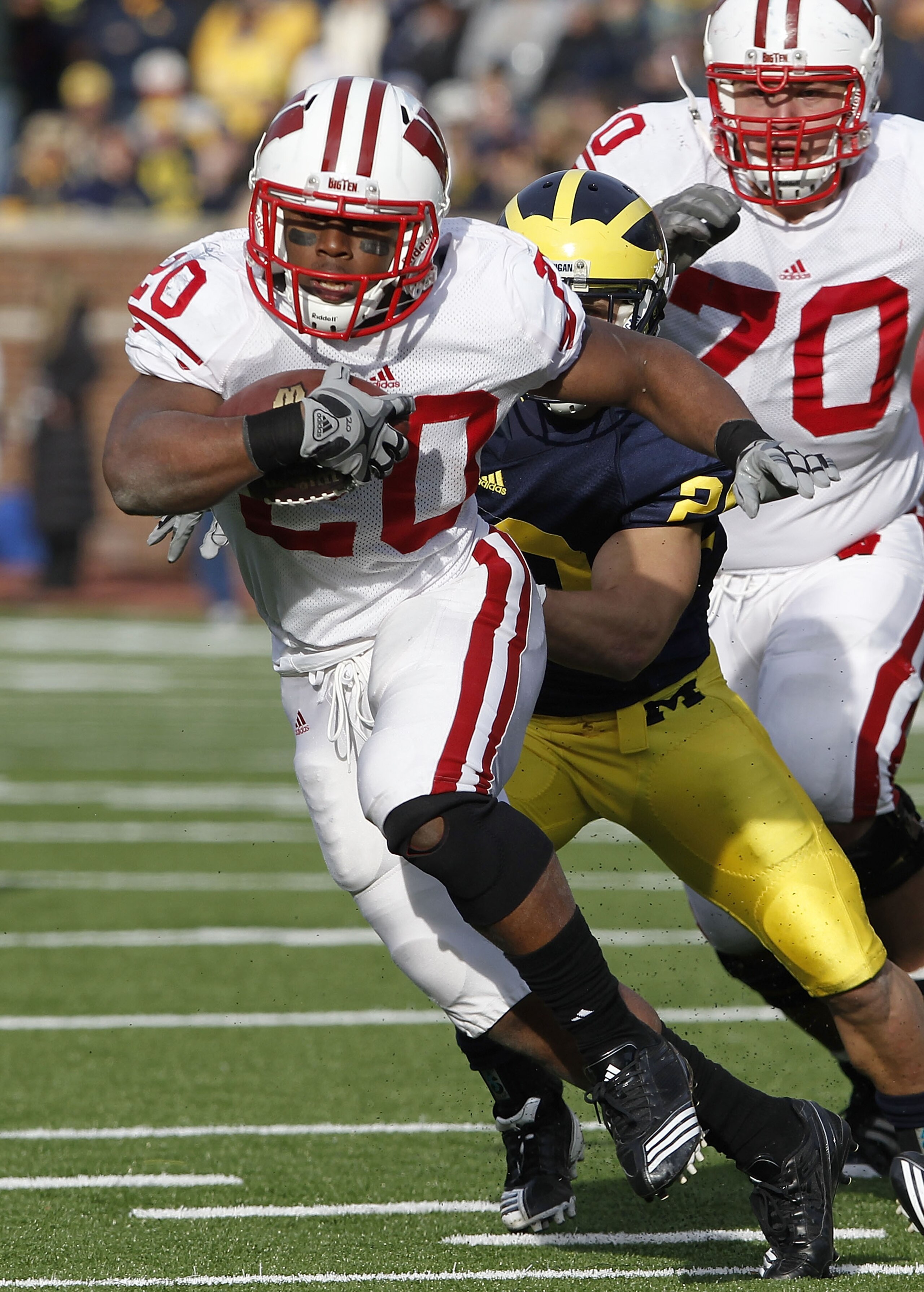 ANN ARBOR, MI - NOVEMBER 20: James White #20 of the Wisconsin Badgers looks for running room while playing the Michigan Wolverines at Michigan Stadium on November 20, 2010 in Ann Arbor, Michigan. Wisconson won the game 48-28. (Photo by Gregory Shamus/Ge ANN ARBOR, MI - NOVEMBER 20: James White #20 of the Wisconsin Badgers looks for running room while playing the Michigan Wolverines at Michigan Stadium on November 20, 2010 in Ann Arbor, Michigan. Wisconson won the game 48-28. (Photo by Gregory Shamus/Ge