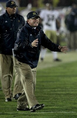 LOS ANGELES - NOVEMBER 27: Head coach Brian Kelly of the Notre Dame Fighting Irish gestures during the game with the USC Trojans at the Los Angeles Memorial Coliseum on November 27, 2010 in Los Angeles, California. Notre Dame won 20-16. (Photo by Stephe LOS ANGELES - NOVEMBER 27: Head coach Brian Kelly of the Notre Dame Fighting Irish gestures during the game with the USC Trojans at the Los Angeles Memorial Coliseum on November 27, 2010 in Los Angeles, California. Notre Dame won 20-16. (Photo by Stephe