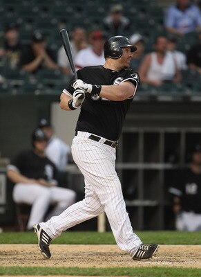 CHICAGO, IL - MAY 22: Adam Dunn #32 of the Chicago White Sox hits a run-scoring single in the 8th inning against the Los Angeles Dodgers at U.S. Cellular Field on May 22, 2011 in Chicago, Illinois. The White Sox defeated the Dodgers 8-3. (Photo by Jonatha