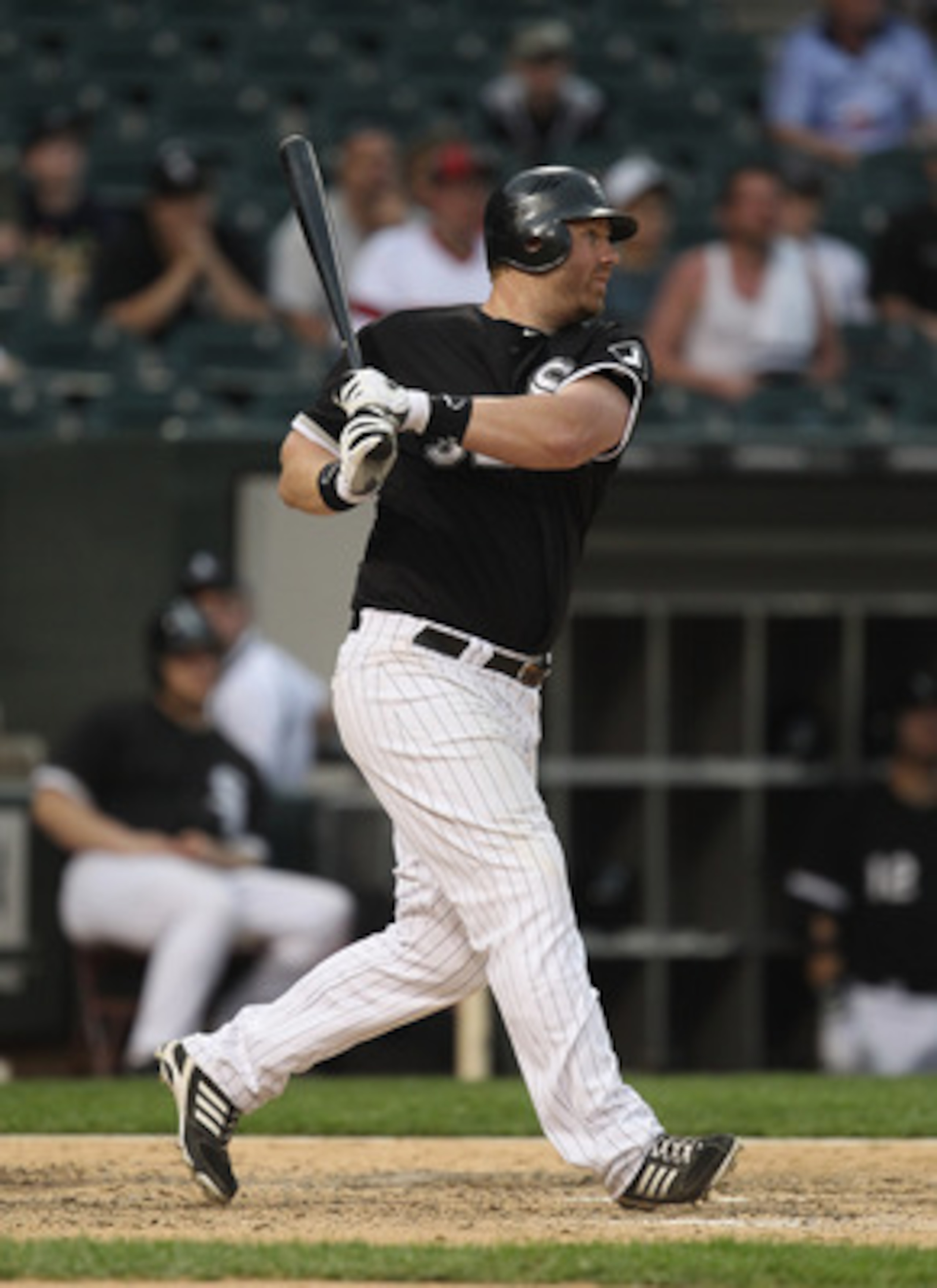 CHICAGO, IL - MAY 22: Adam Dunn #32 of the Chicago White Sox hits a run-scoring single in the 8th inning against the Los Angeles Dodgers at U.S. Cellular Field on May 22, 2011 in Chicago, Illinois. The White Sox defeated the Dodgers 8-3. (Photo by Jonatha